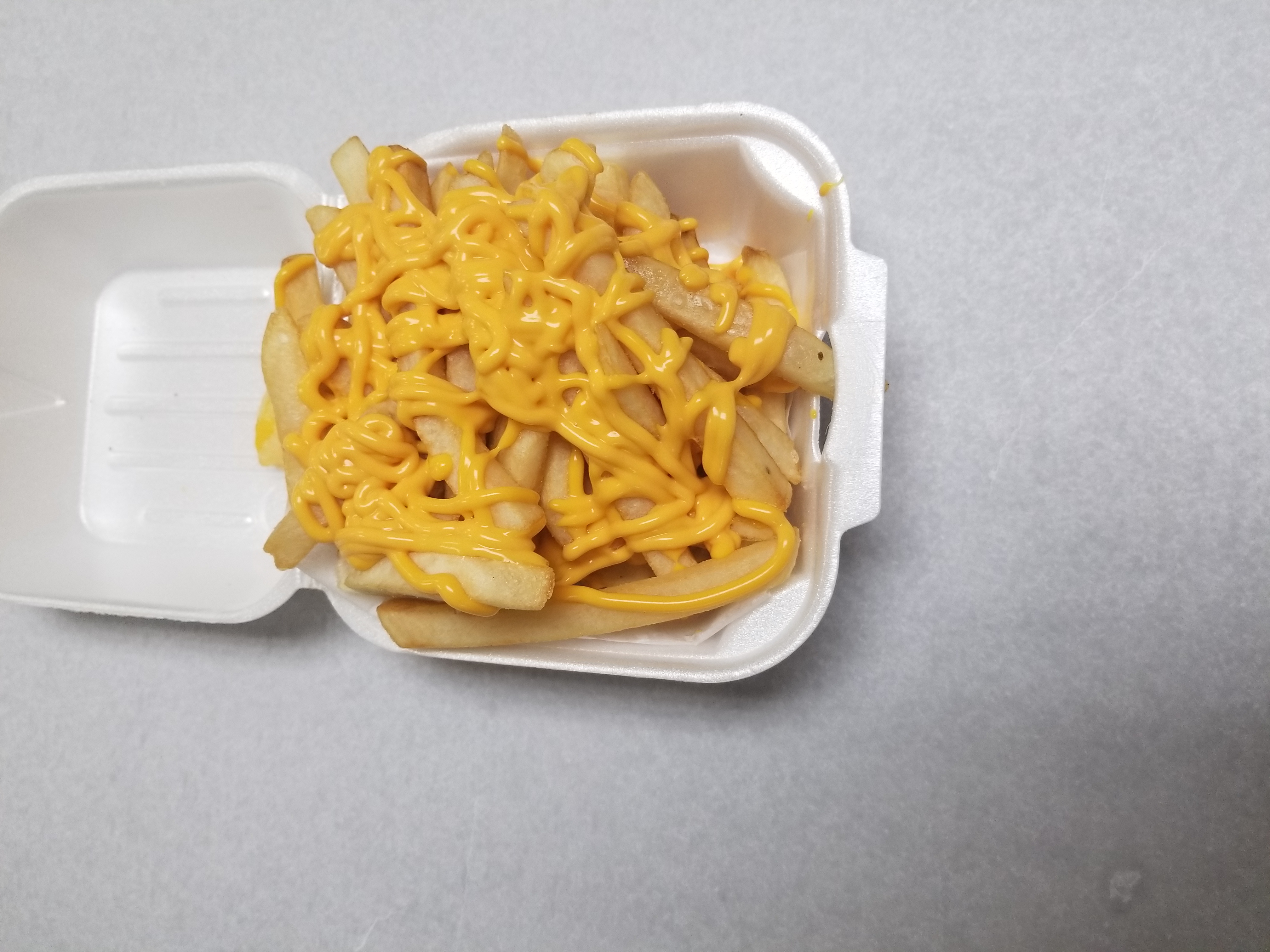 Order Cheesy Fries food online from H & A Deli store, Rochester on bringmethat.com