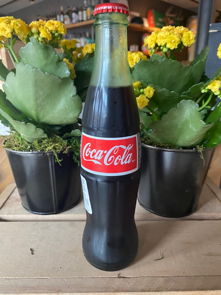 Order 12oz Coke  food online from Chop Shop store, Chicago on bringmethat.com