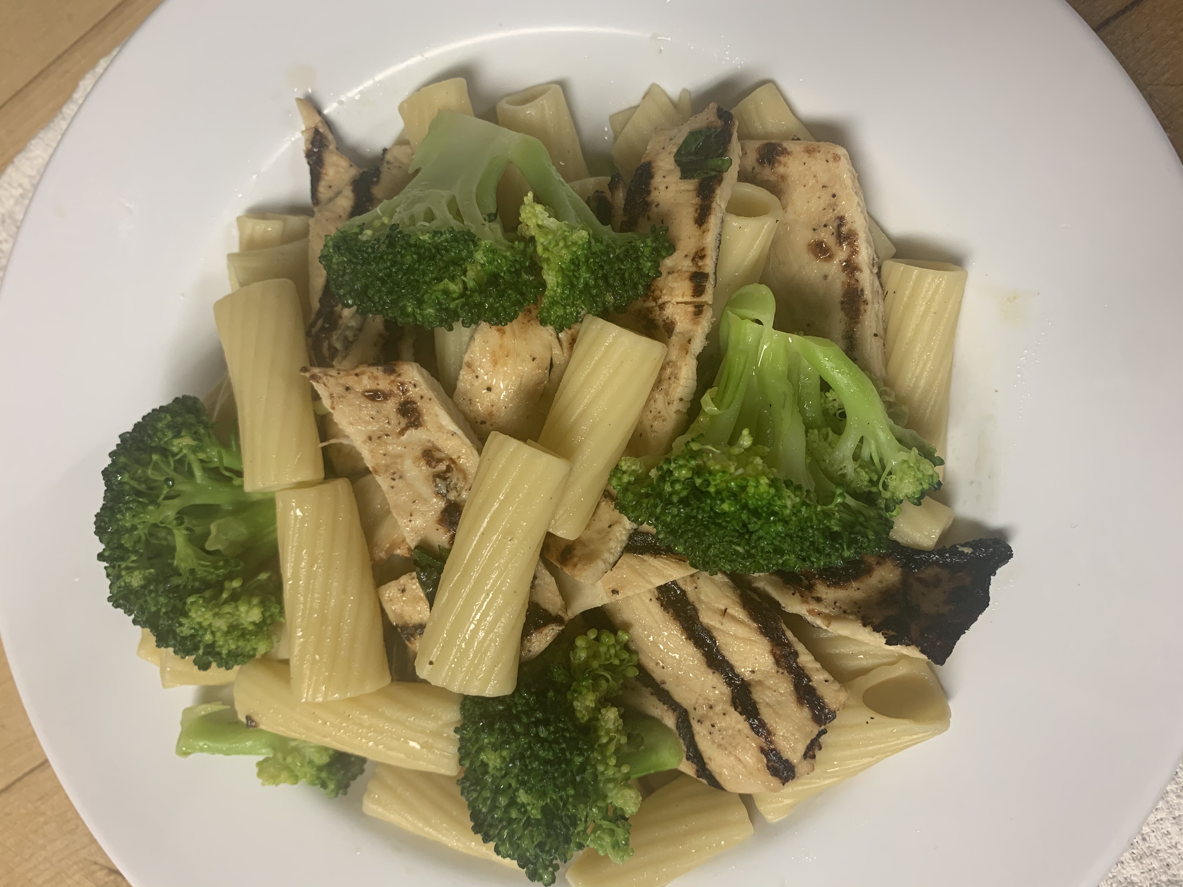 Order Rigatoni Broccoli Garlic Oil W/ Grilled chicken food online from Taste of Italy Pizza store, Corona on bringmethat.com