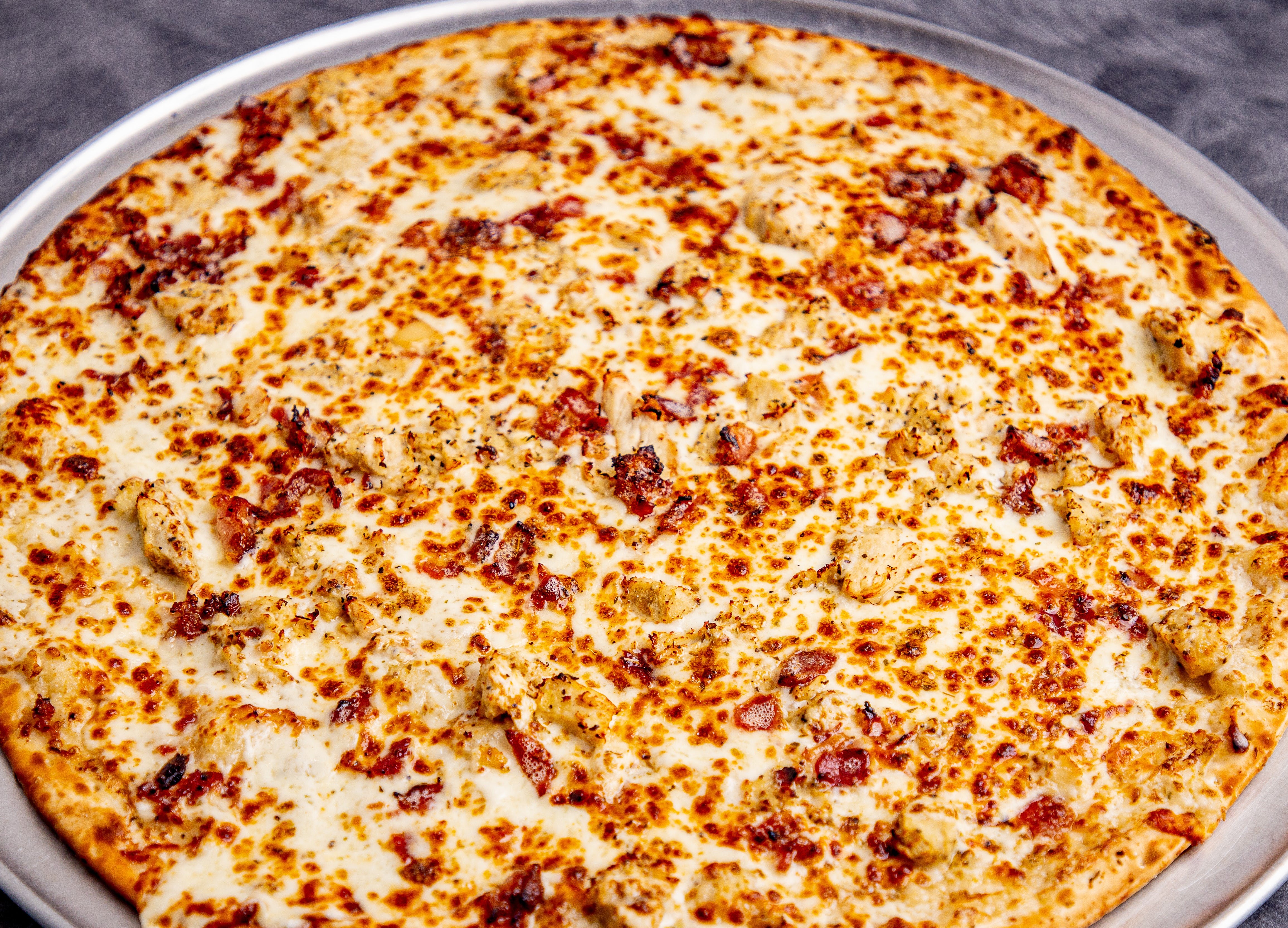 Order Chicken Bacon Ranch Pizza - Quarter (2 Slices) food online from Crooked Crust-Farmers Branch store, Farmers Branch on bringmethat.com