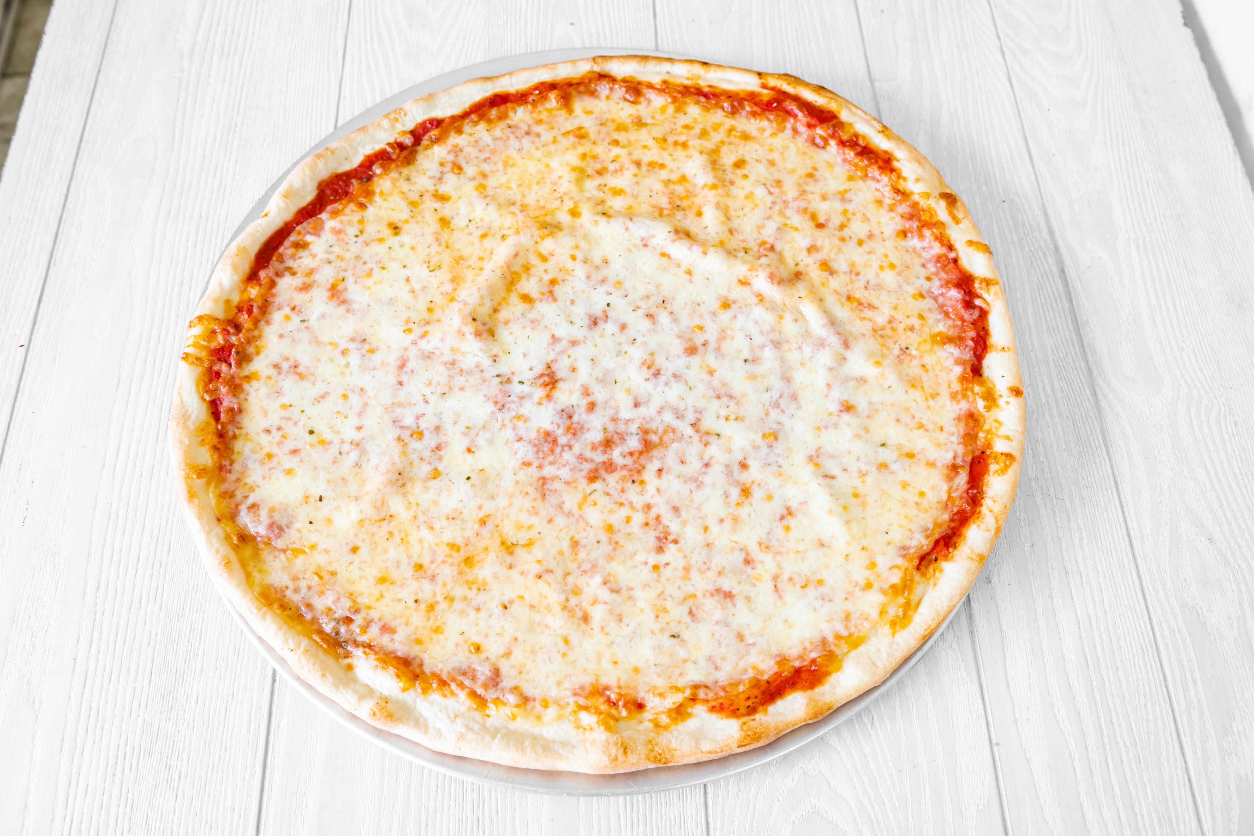 Order Plain Pizza - Small food online from Joe's Pizza store, Easton on bringmethat.com