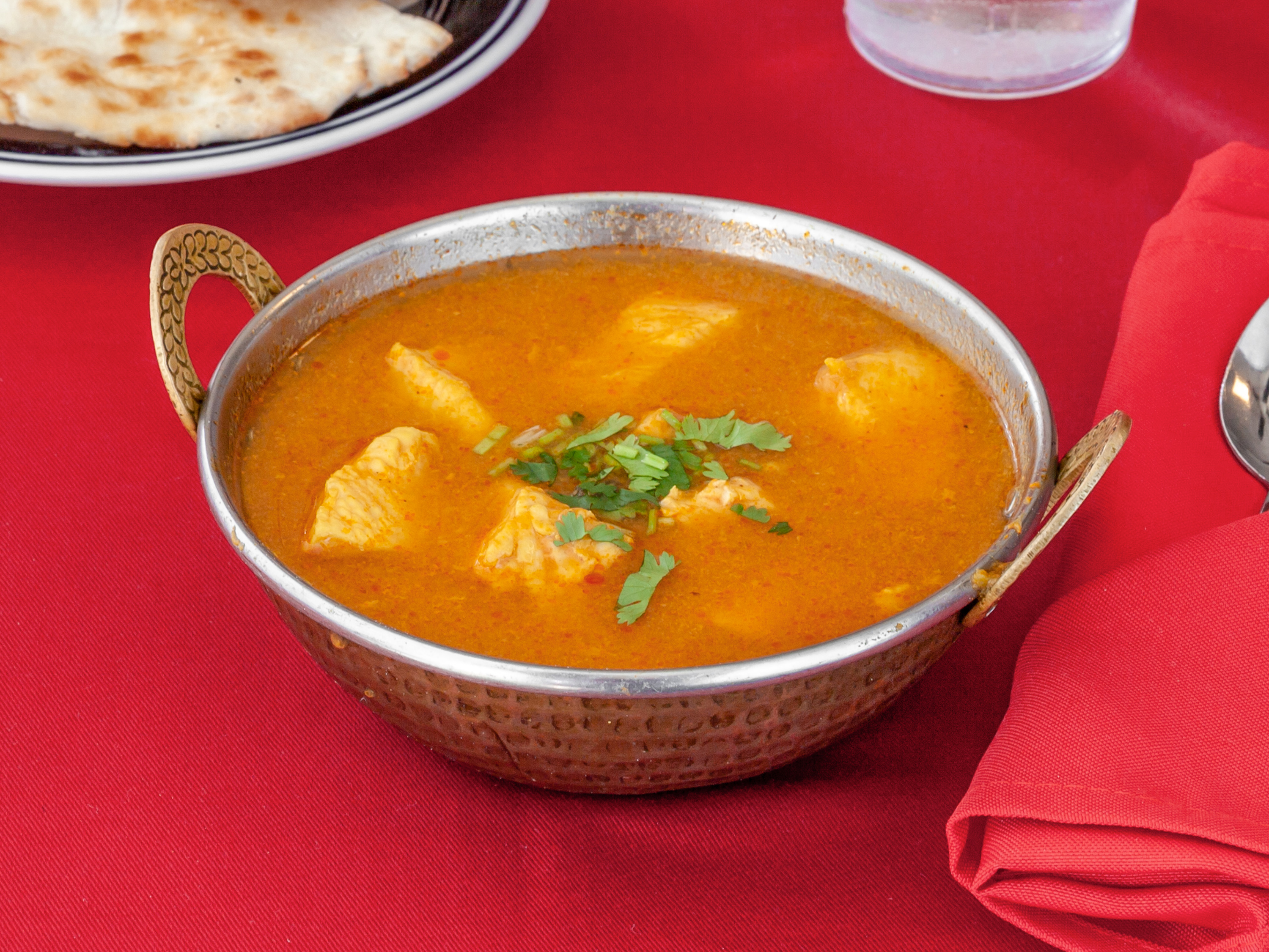 Order 69. Chicken Curry food online from Ambar Indian Restaurant store, Champaign on bringmethat.com