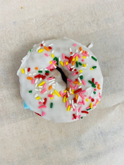 Order White Sprinkle Cake food online from Highland Donuts store, Bakersfield on bringmethat.com