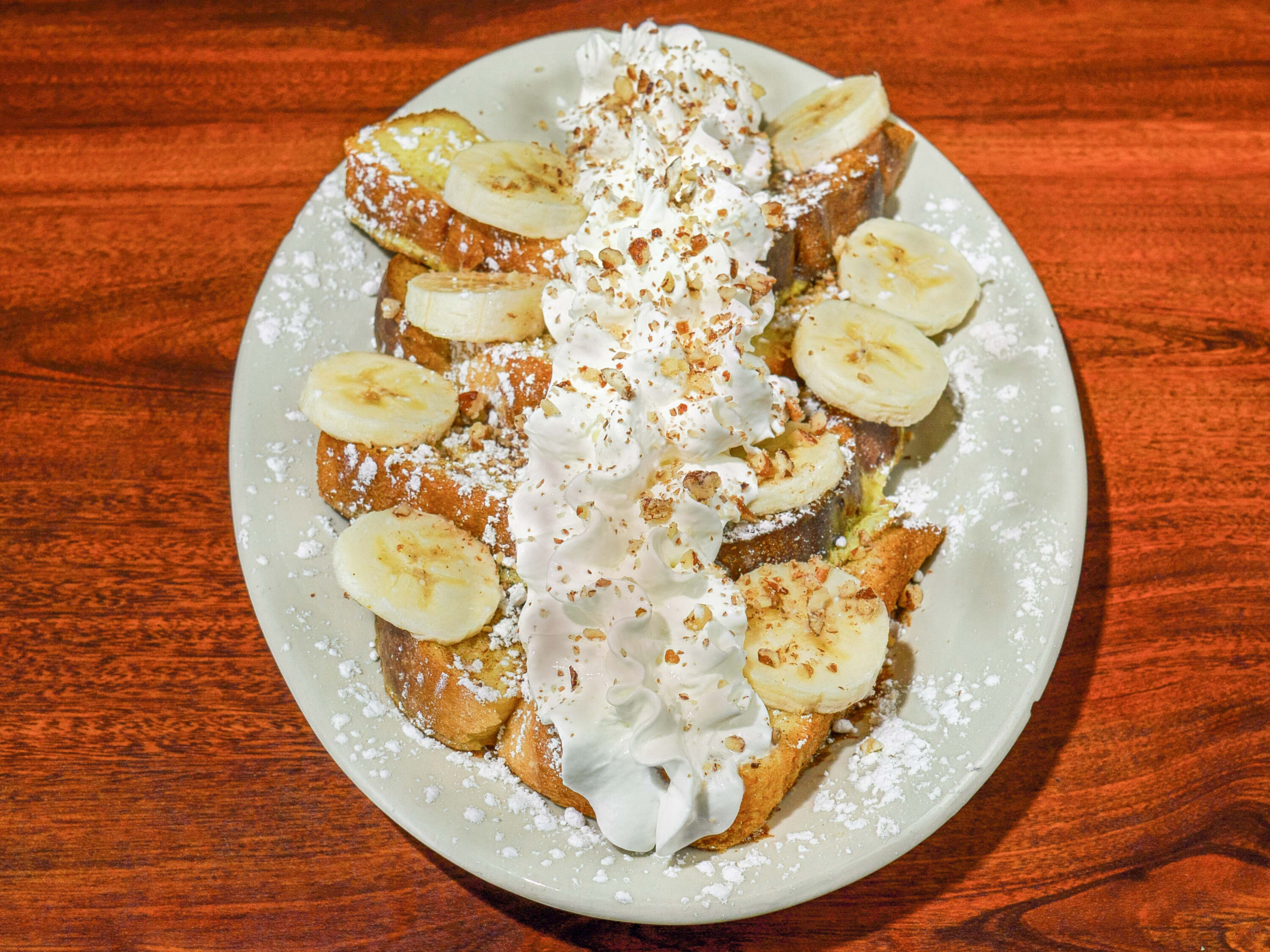 Order Loaded French Toast  food online from Bacon's Bistro and Cafe store, Hurst on bringmethat.com