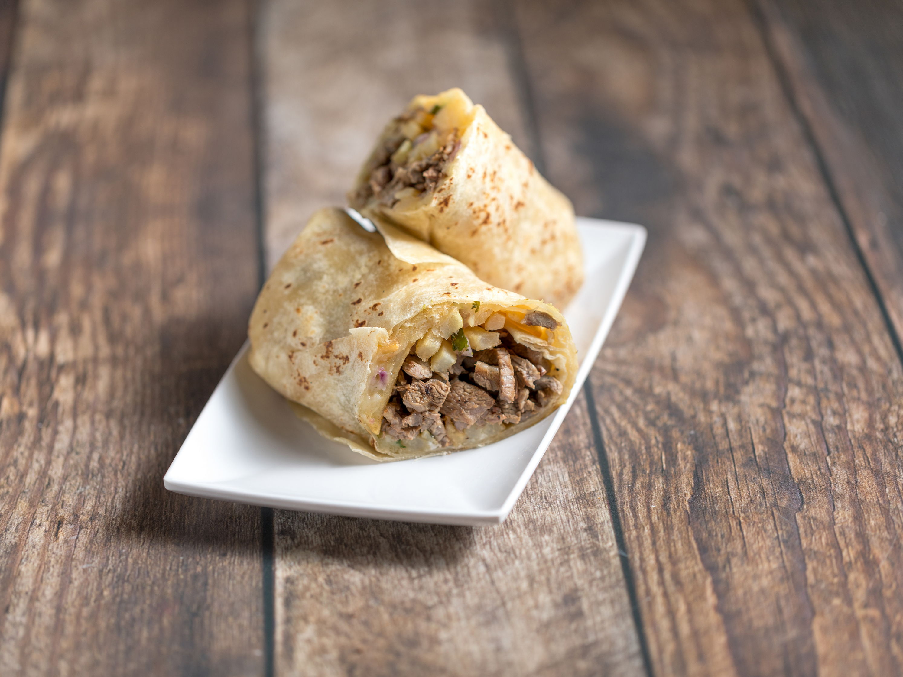 Order California Burrito food online from Tacos El Cabron store, San Diego on bringmethat.com