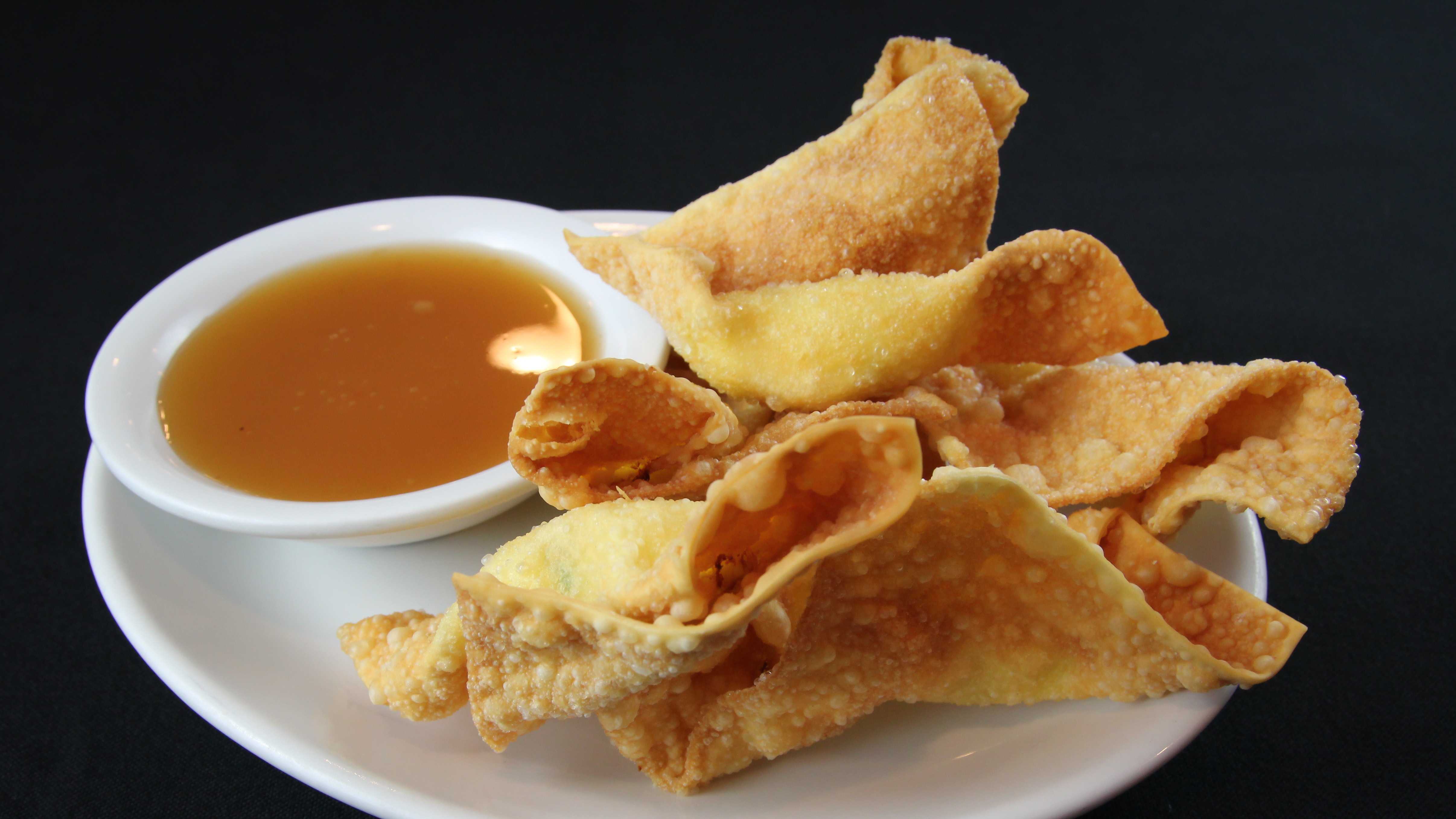 Order Crab Cream Cheese Wontons food online from Basil Thai Cafe store, Columbus on bringmethat.com