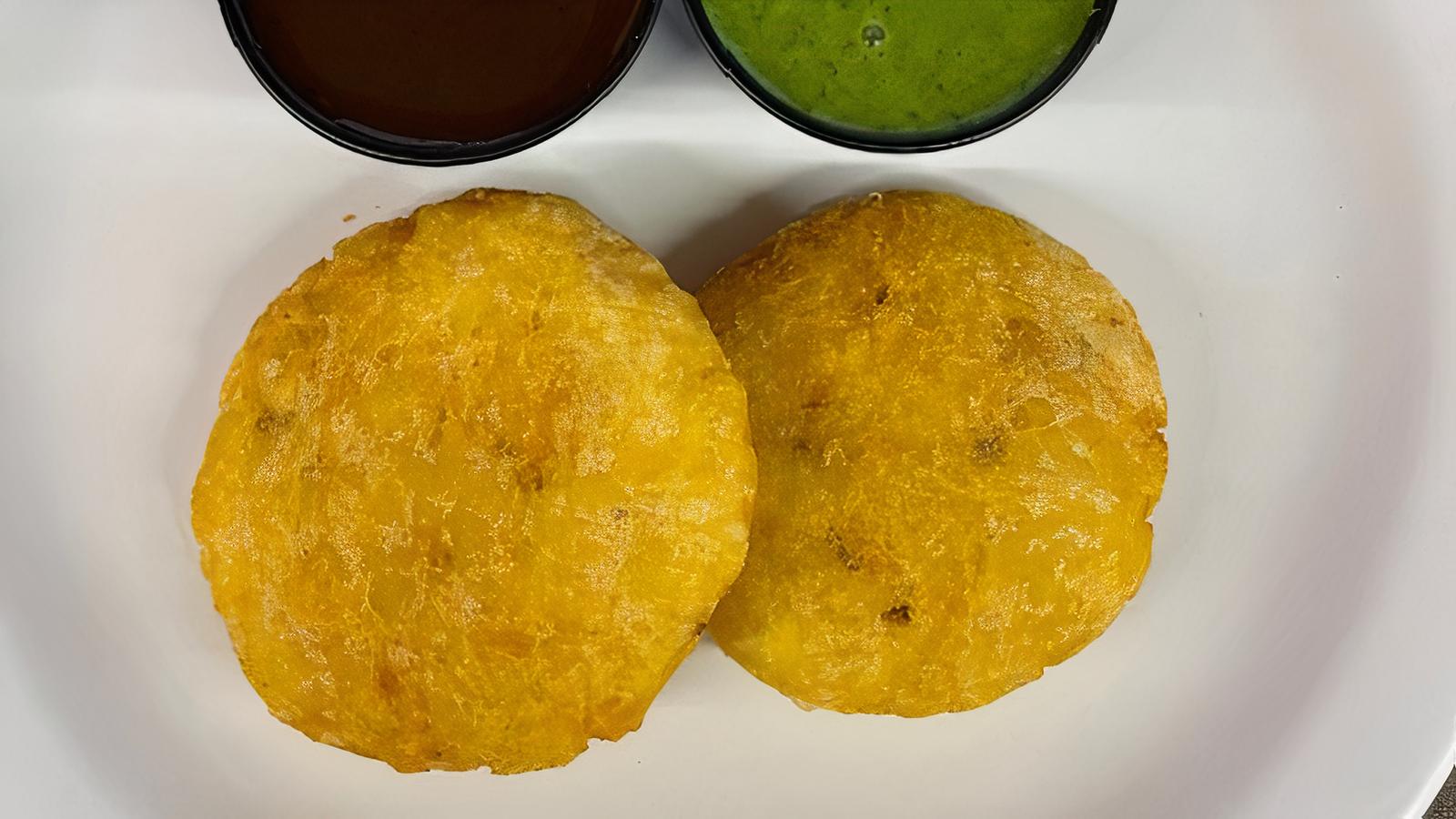 Order Aloo Tikki (2 Pcs.) food online from Indian Cafe store, East Moline on bringmethat.com