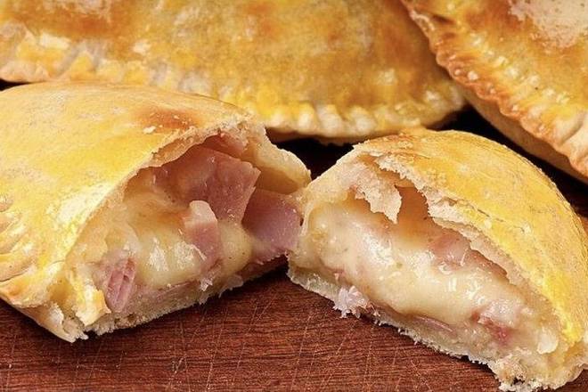 Order Empanada de Jamón y Queso / Ham and Cheese food online from Flavors Of Heaven store, Saint Cloud on bringmethat.com