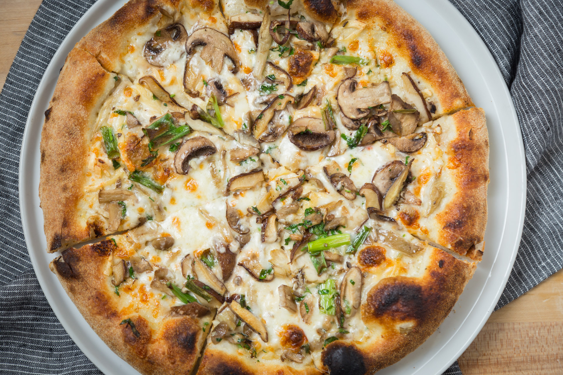 Order Mushroom Truffle Pizza | Lunch food online from Bossa Nova Inc store, Hawthorne on bringmethat.com