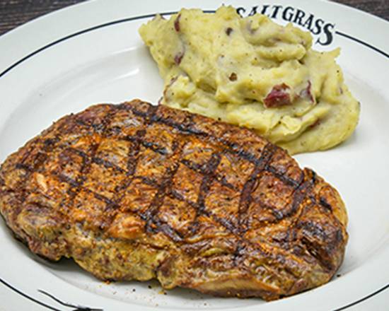 Order Pat’s Ribeye food online from Saltgrass Steakhouse store, Plano on bringmethat.com