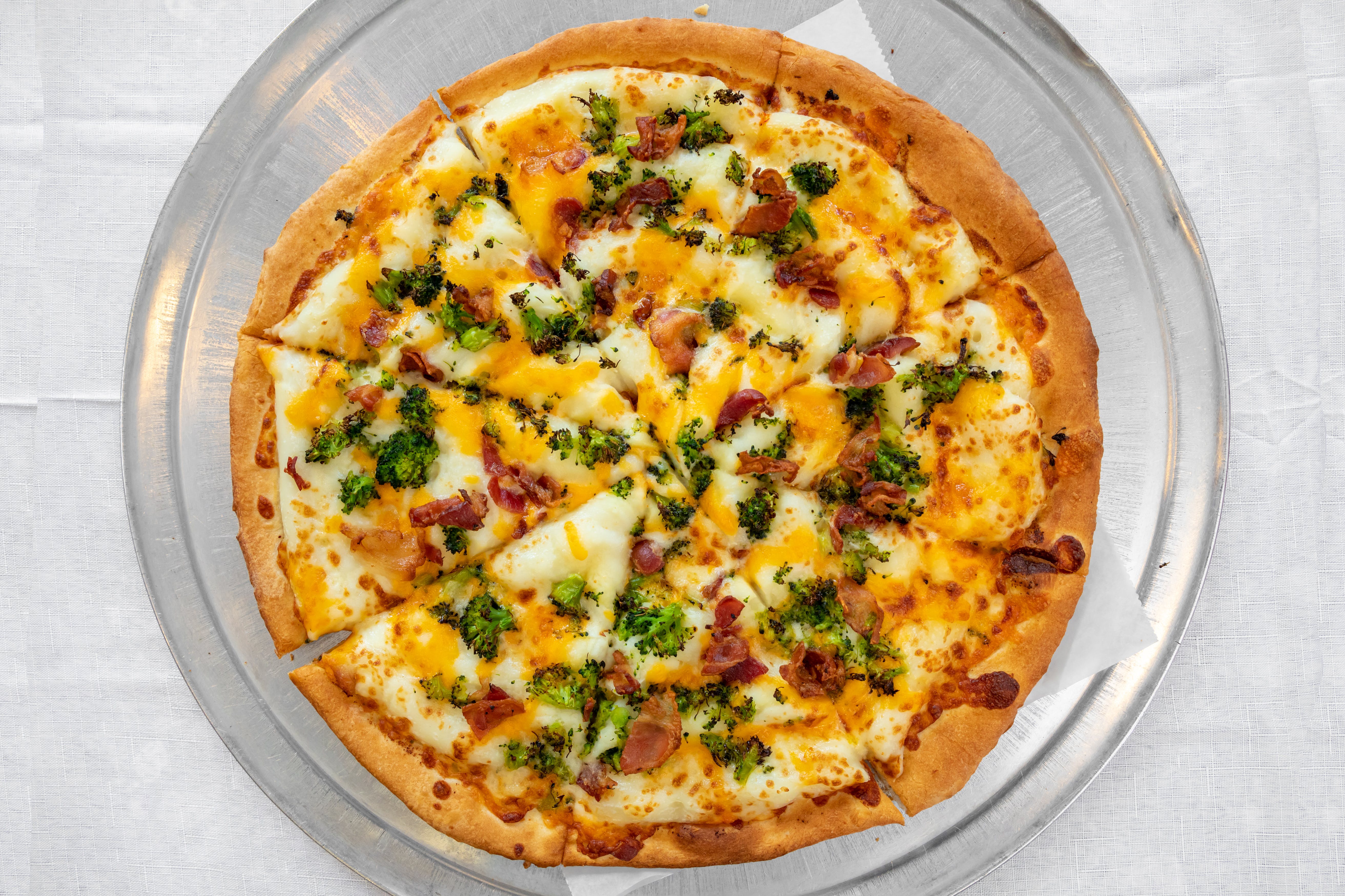 Order Loaded Potato Pizza - Small 10'' food online from Giove's Pizza store, Trumbull on bringmethat.com