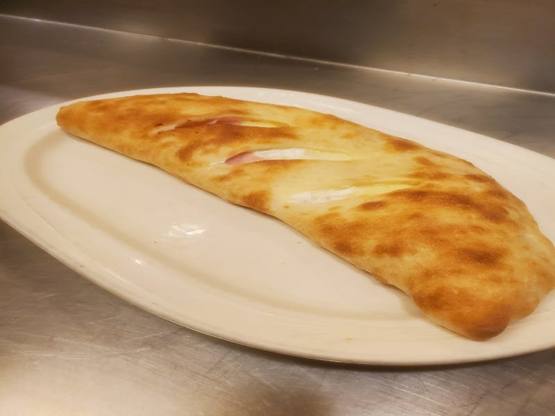 Order Calzone - Small food online from Pizza Leone store, Fairfield on bringmethat.com