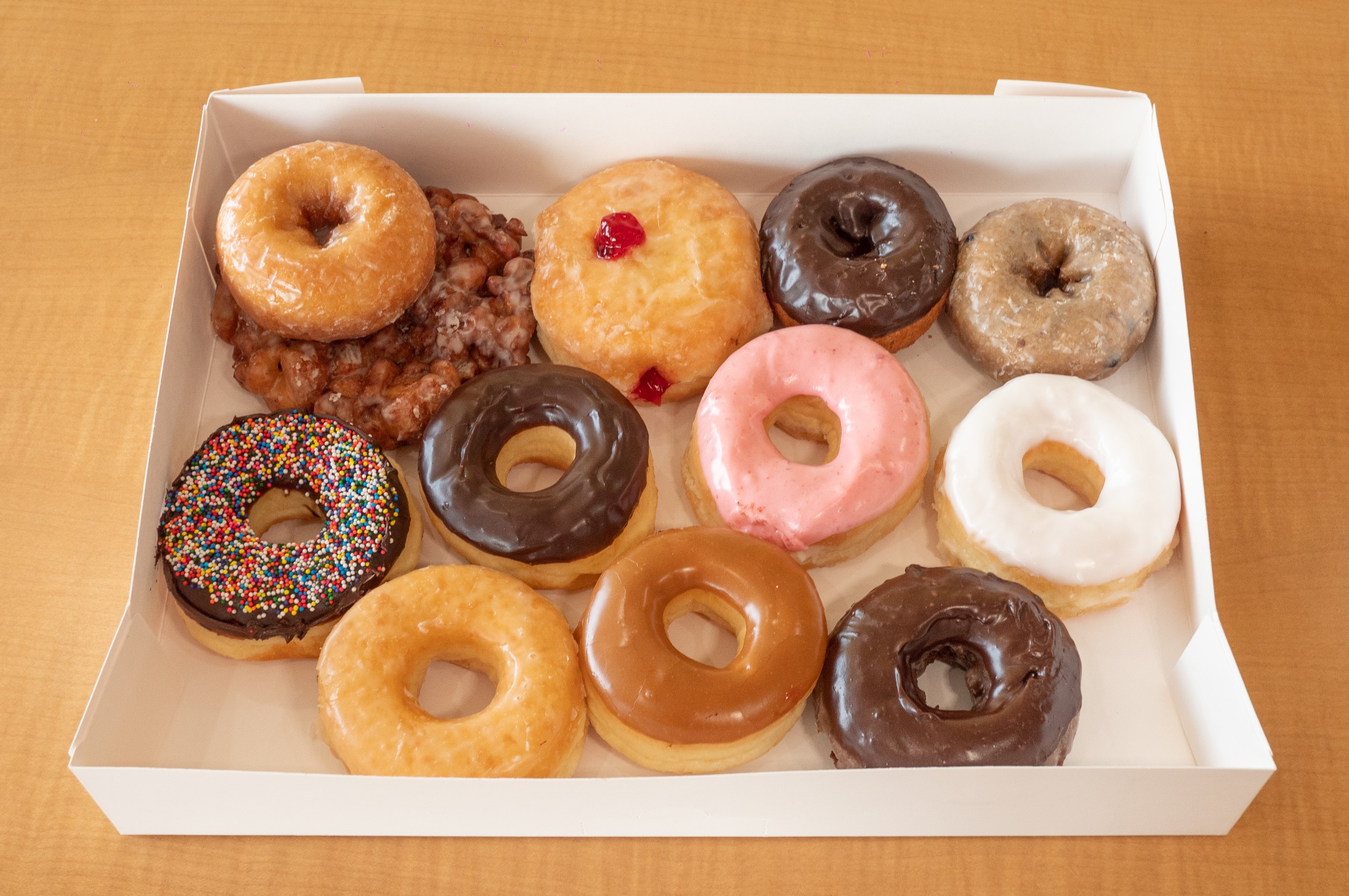 Order Dozen Pre-Assorted Donuts (Mixed) food online from Sara Donuts store, Euless on bringmethat.com