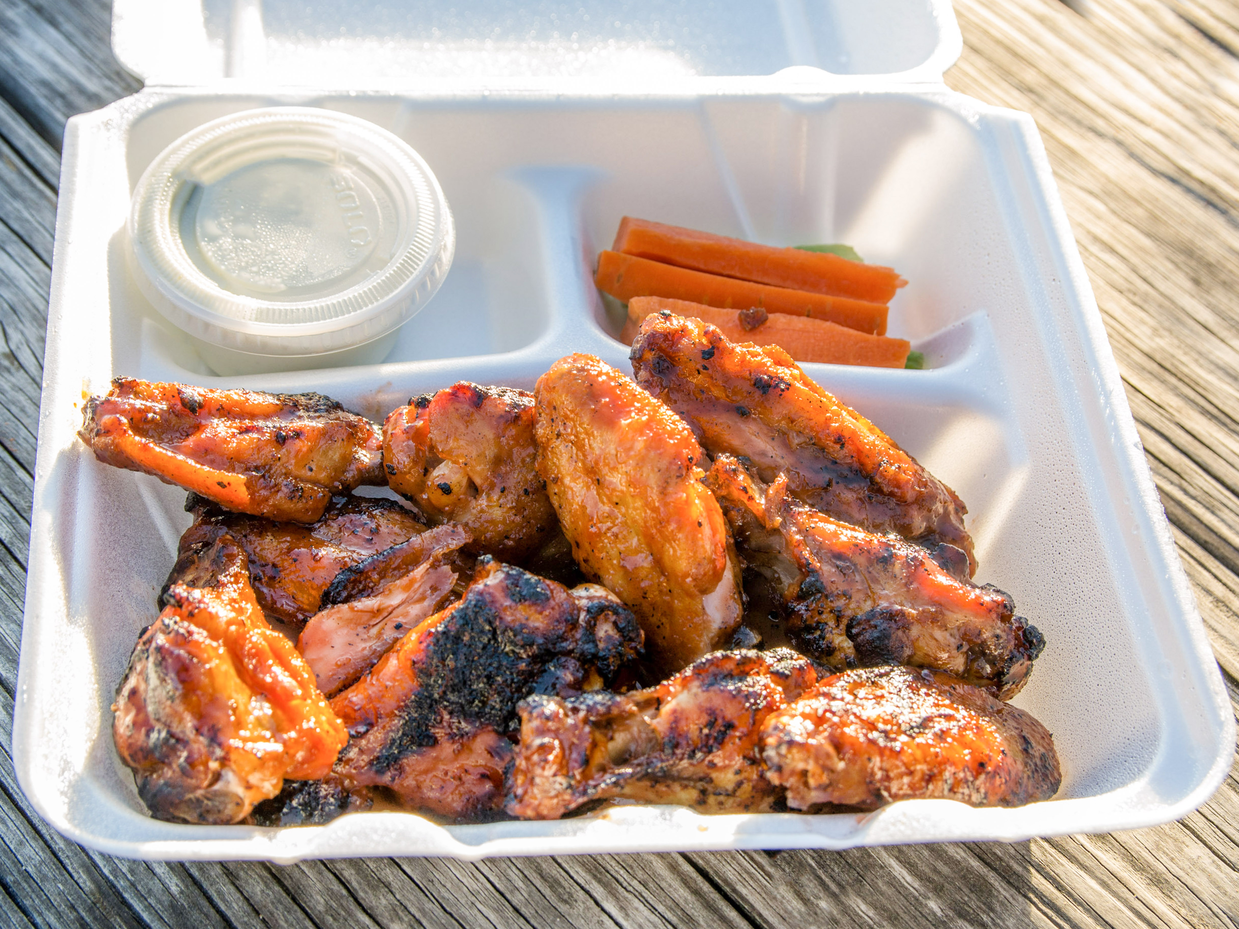 Order Snacker 10 Pieces Wings food online from Charcoal Deli store, Cockeysville on bringmethat.com