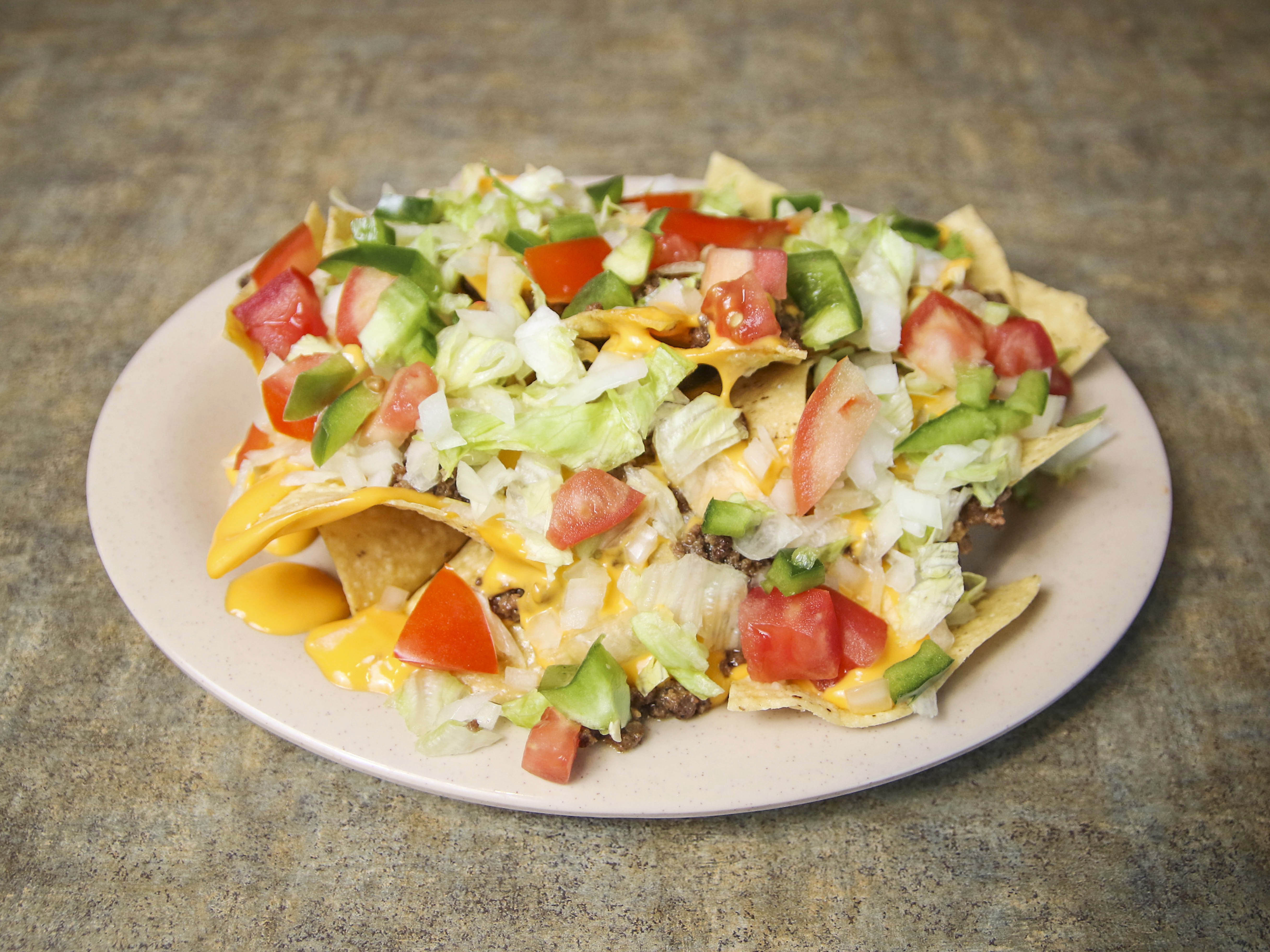 Order Nacho Supreme food online from Jimmys Coney Grill store, Saint Clair Shores on bringmethat.com