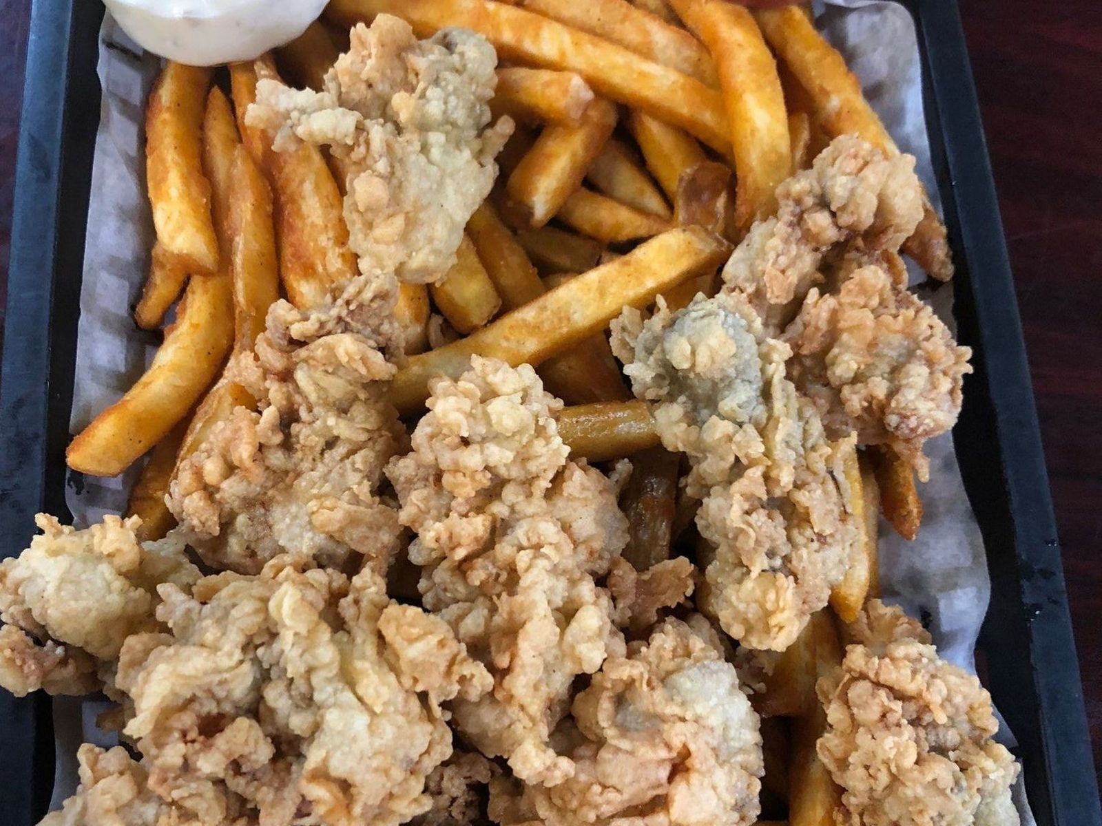 Order FRIED OYSTERS BASKET food online from Super Crab Juicy Seafood store, Rochester on bringmethat.com