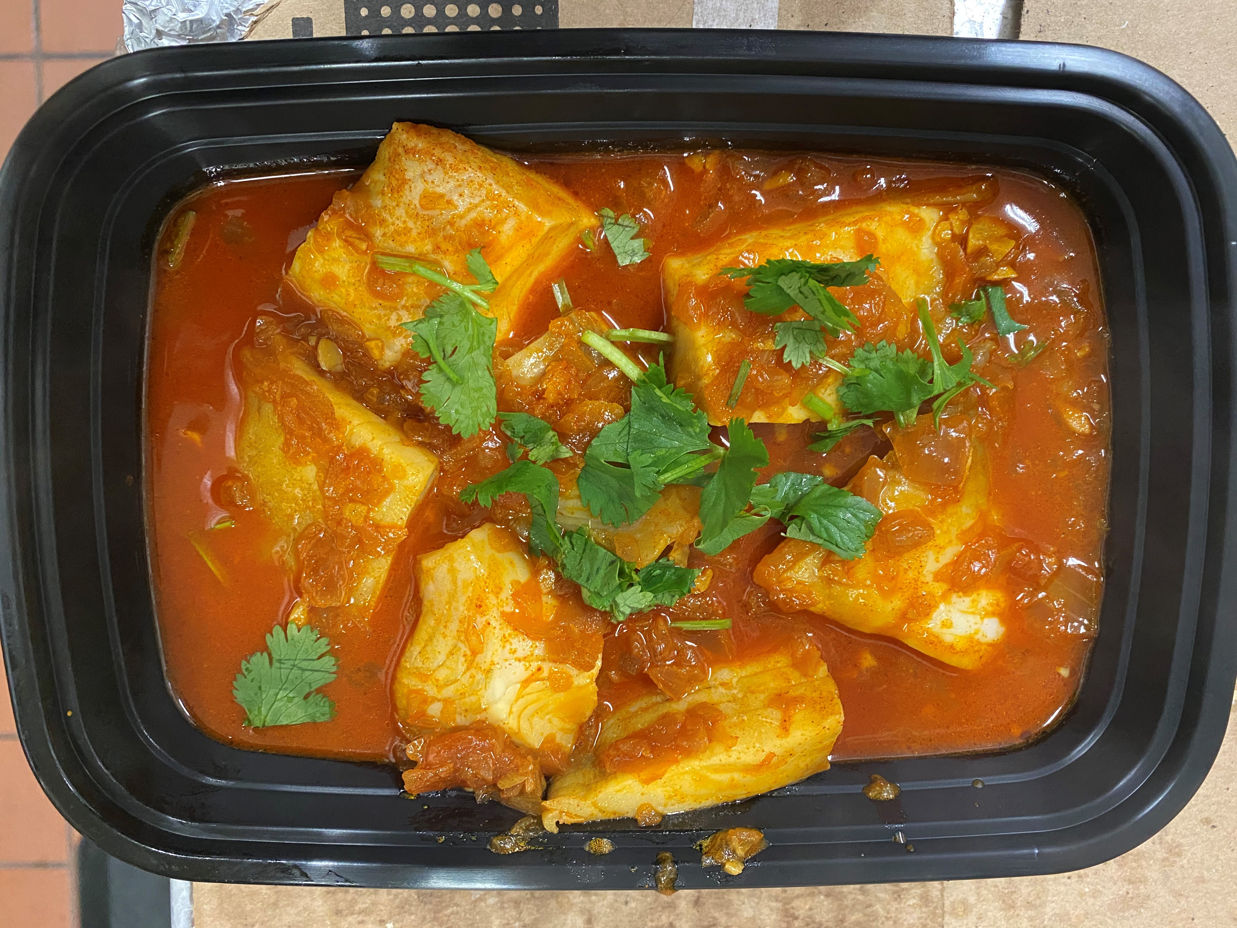 Order 58. Fish Curry Tilapia Filet food online from Burma Bistro store, Santa Clara on bringmethat.com
