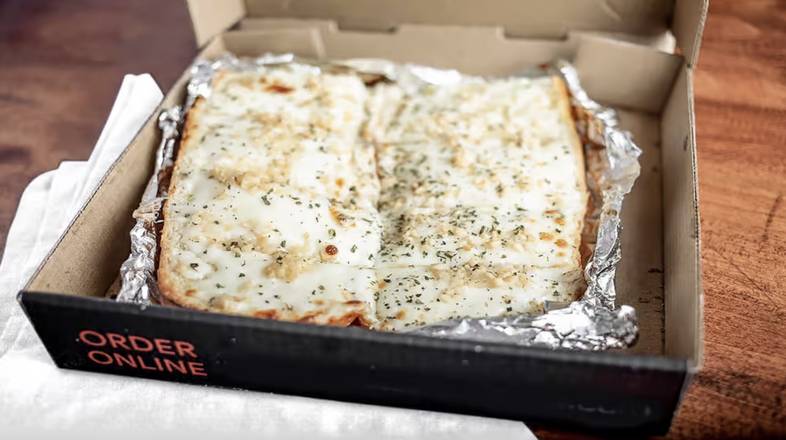 Order Garlic Bread with Cheese food online from Mustafio's Pizza store, San Francisco on bringmethat.com