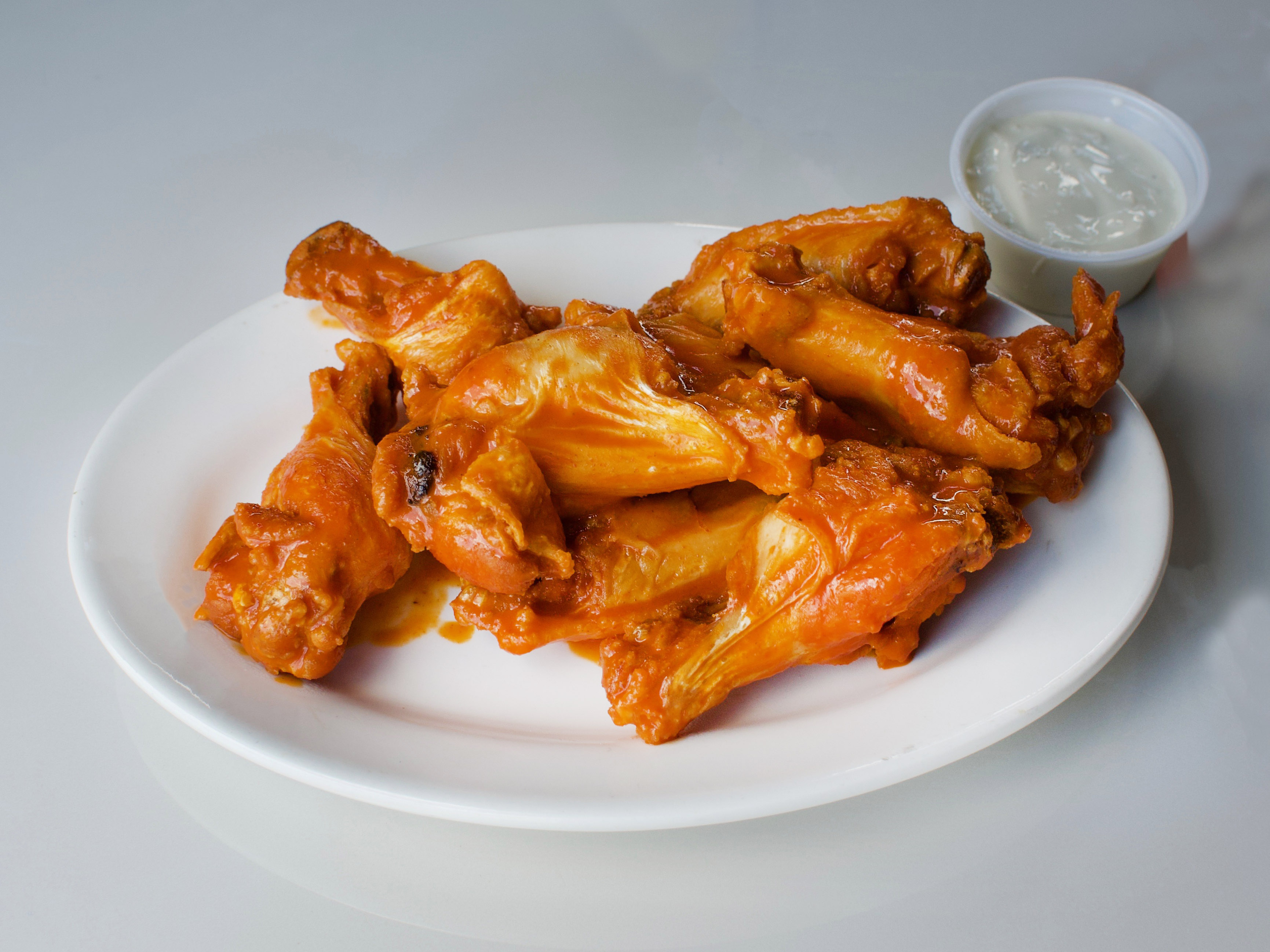 Order Bone-in Wings food online from New Yorker Pizza store, Leesburg on bringmethat.com