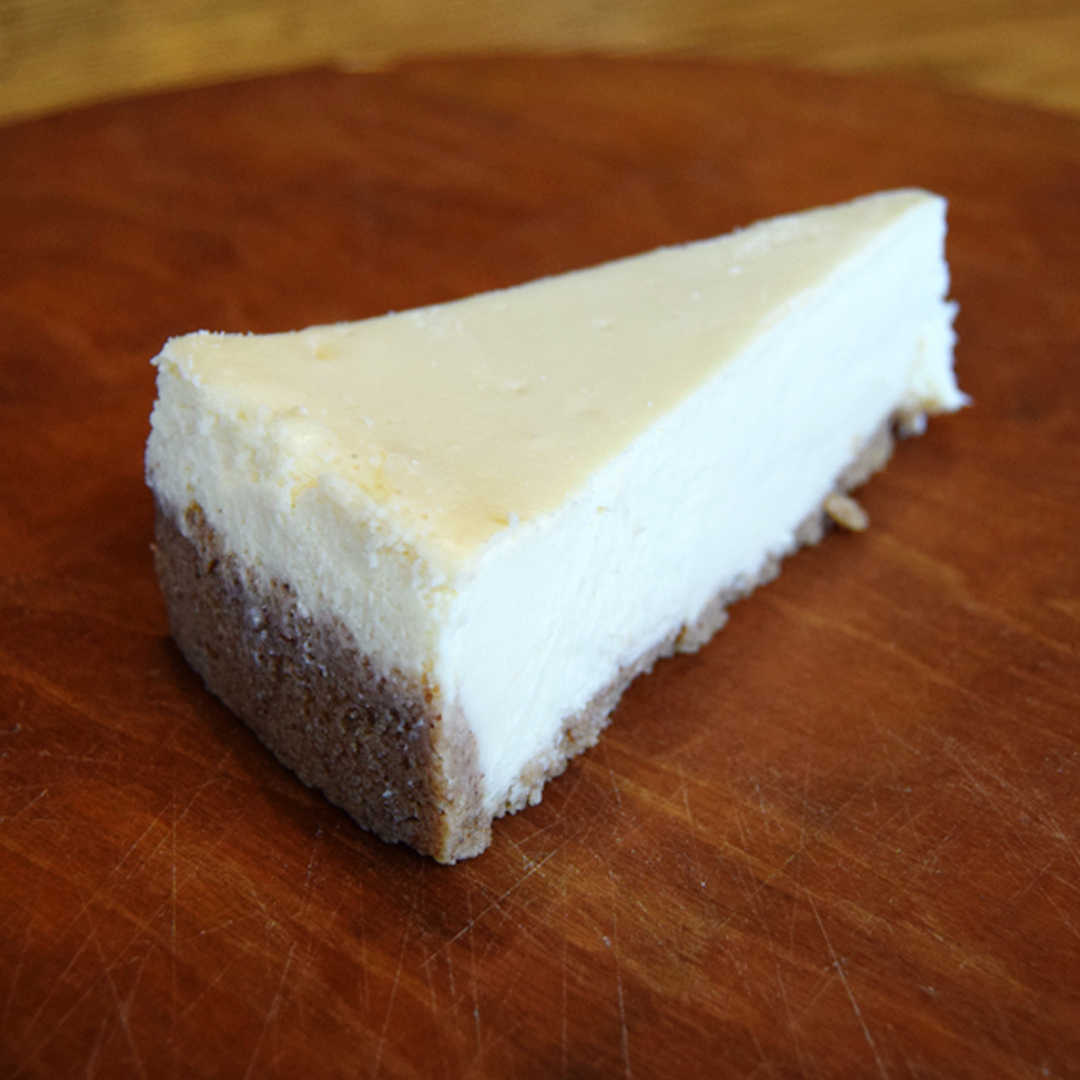 Order New York Cheesecake food online from Mr. Moto's Pizza store, San Diego on bringmethat.com