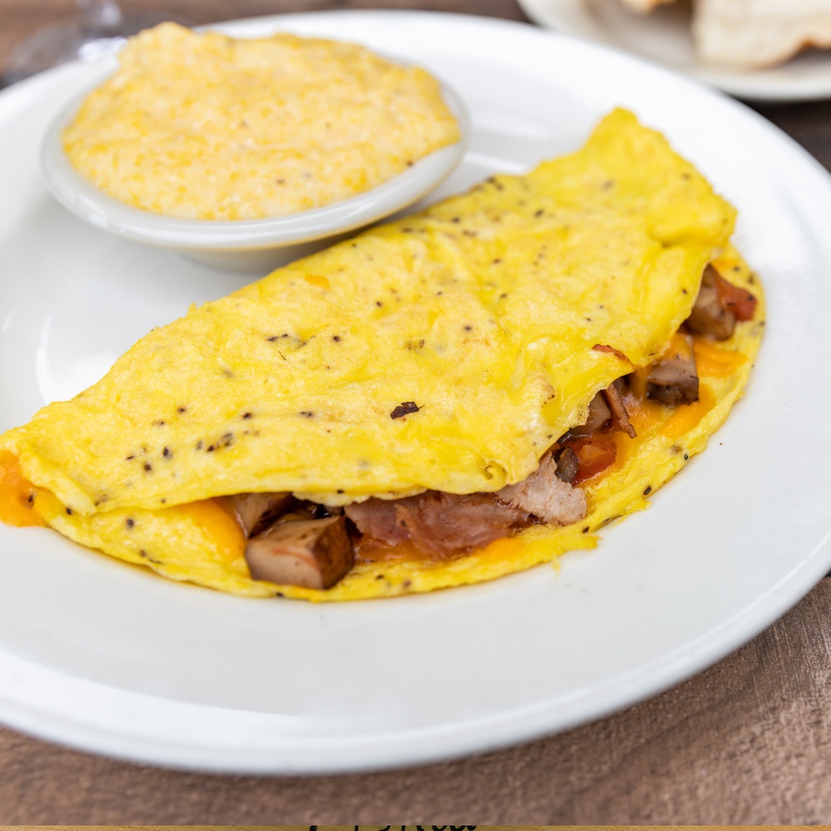 Order Omelet of the Day food online from Five Loaves Cafe store, Mount Pleasant on bringmethat.com