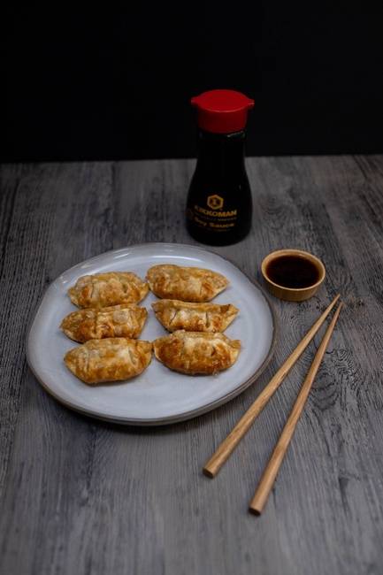 Order Gyoza (6 pcs) food online from Sushi Obsession store, Vallejo on bringmethat.com