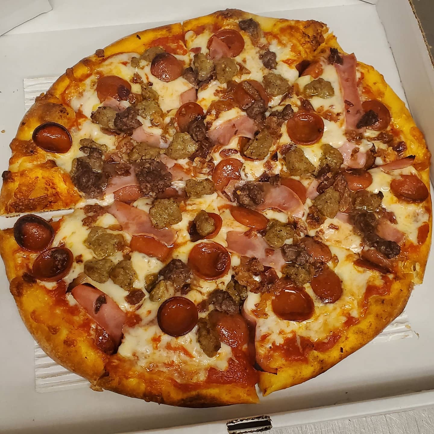 Order Meat Lover's Pizza - Small 10'' food online from Mangia Pizza and Catering store, Westland on bringmethat.com