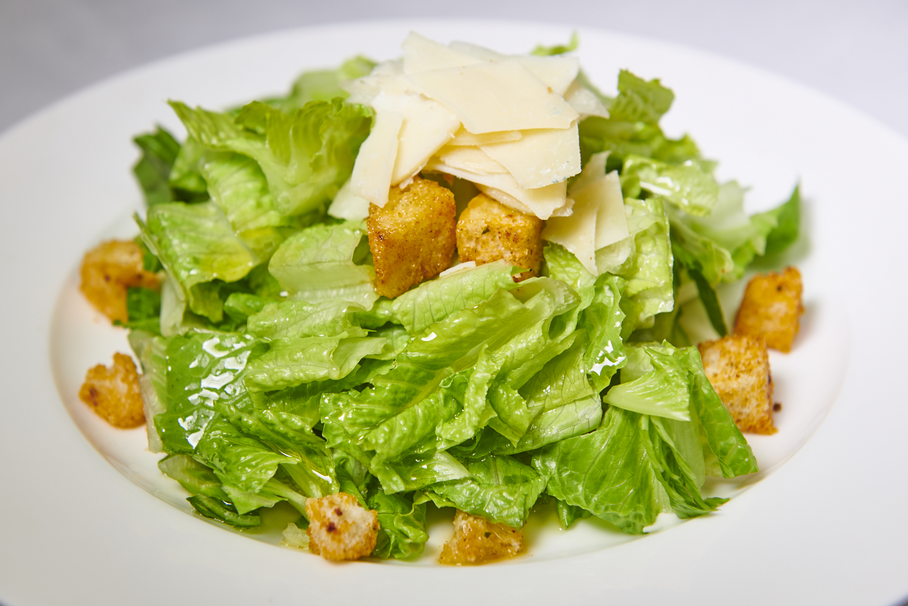 Order Caesar Salad food online from Magno Grill store, New Rochelle on bringmethat.com