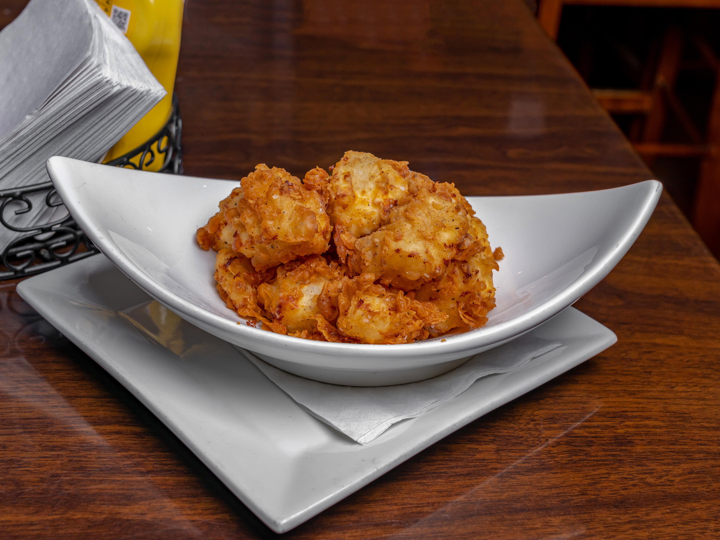 Order Cheese Curds (10x) food online from Crossroads Tabletop Tavern store, Manassas on bringmethat.com
