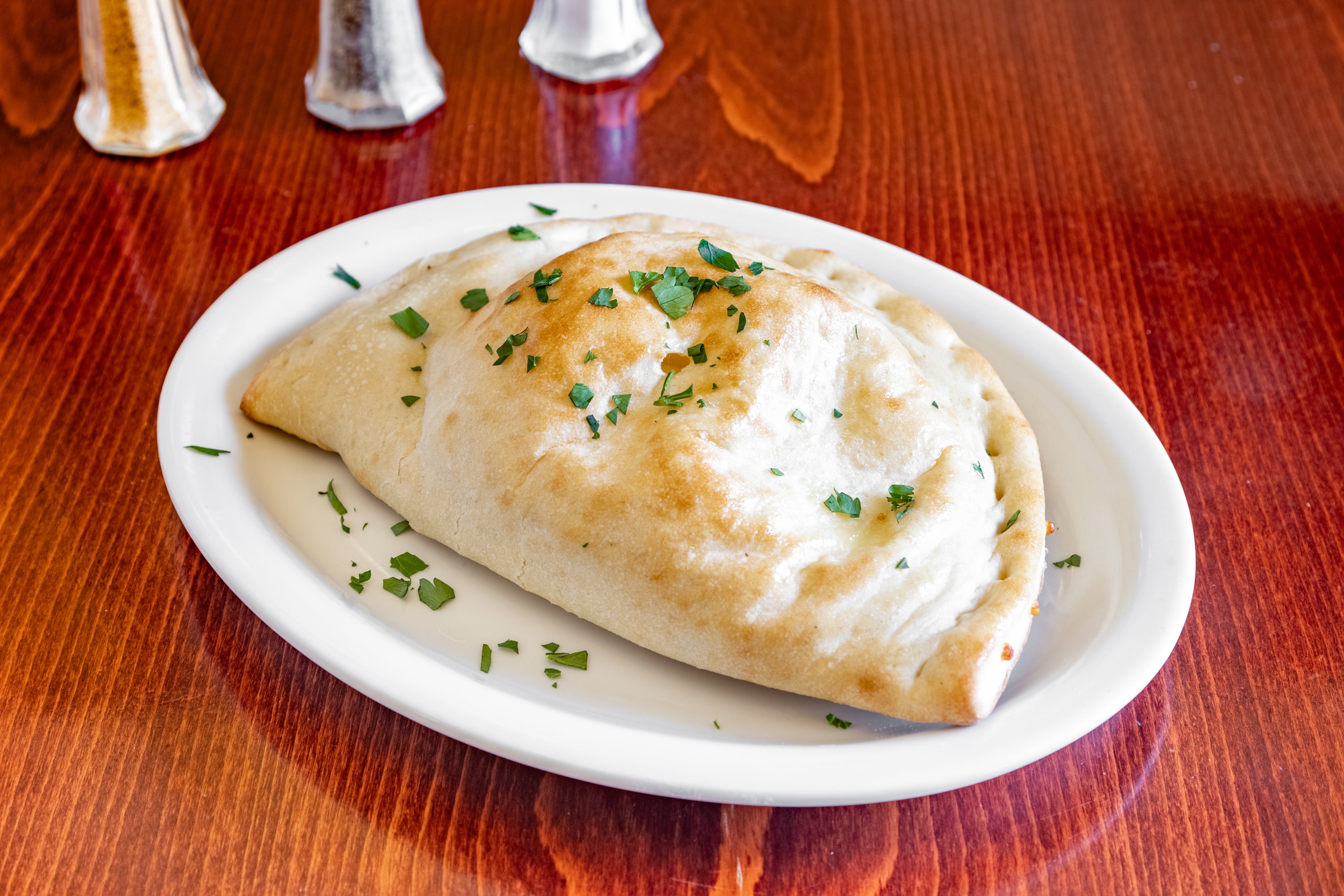 Order Calzone - Small food online from Casa Mia store, Sparta Township on bringmethat.com