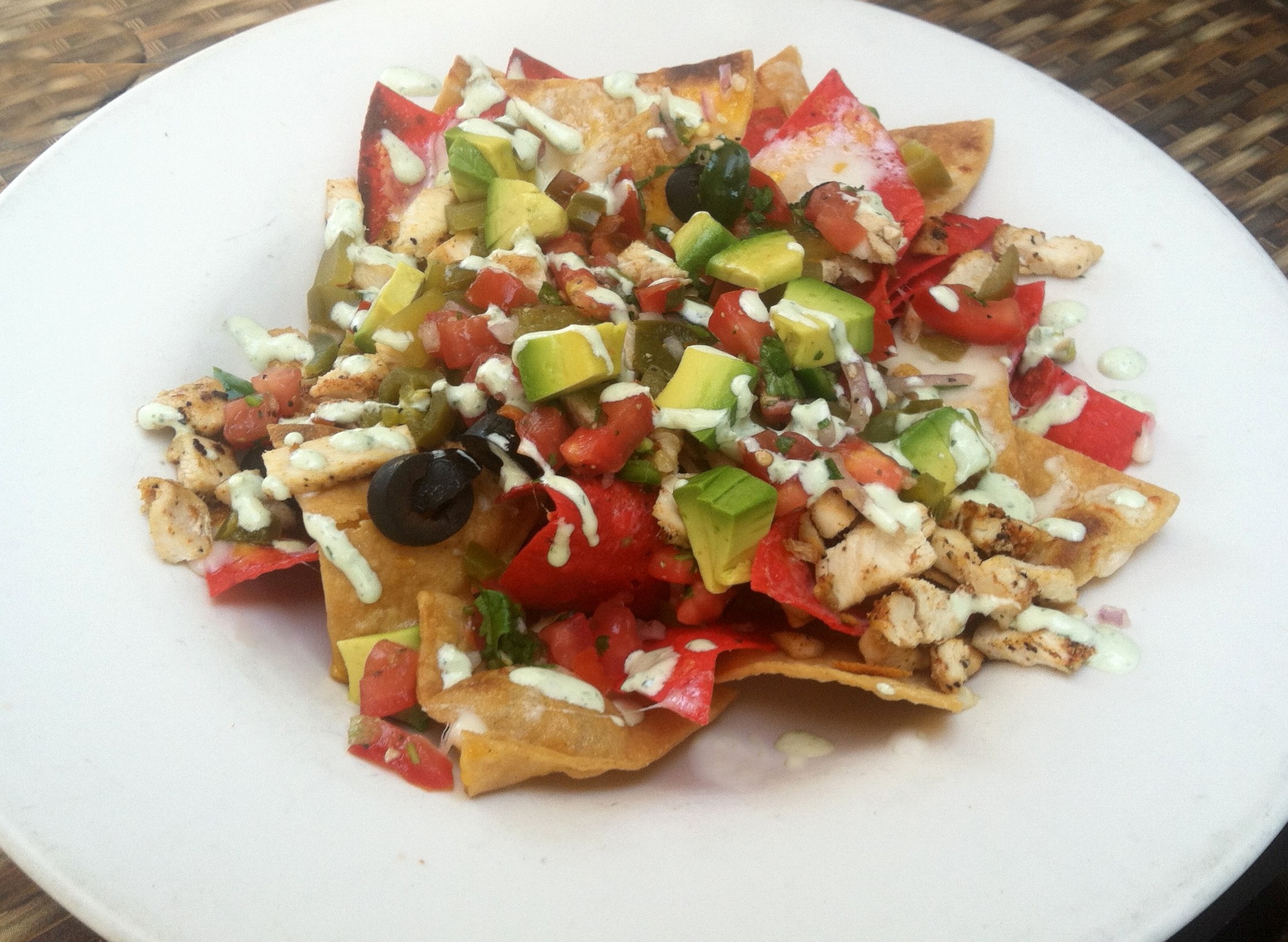 Order Nachos food online from High Park Tap House store, Mission Viejo on bringmethat.com