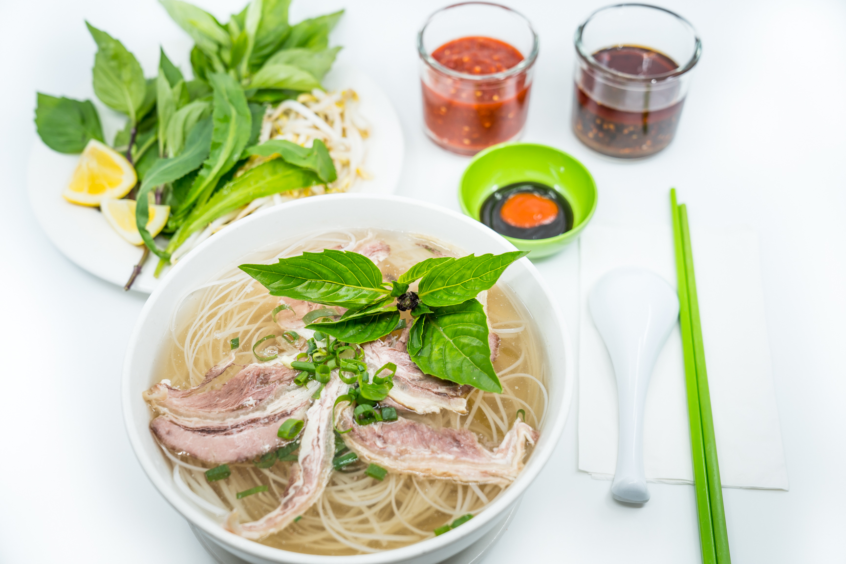 Order 6. Large Steak and Flank Pho Noodle Soup food online from Ha Long Pho Noodle House store, Honolulu on bringmethat.com