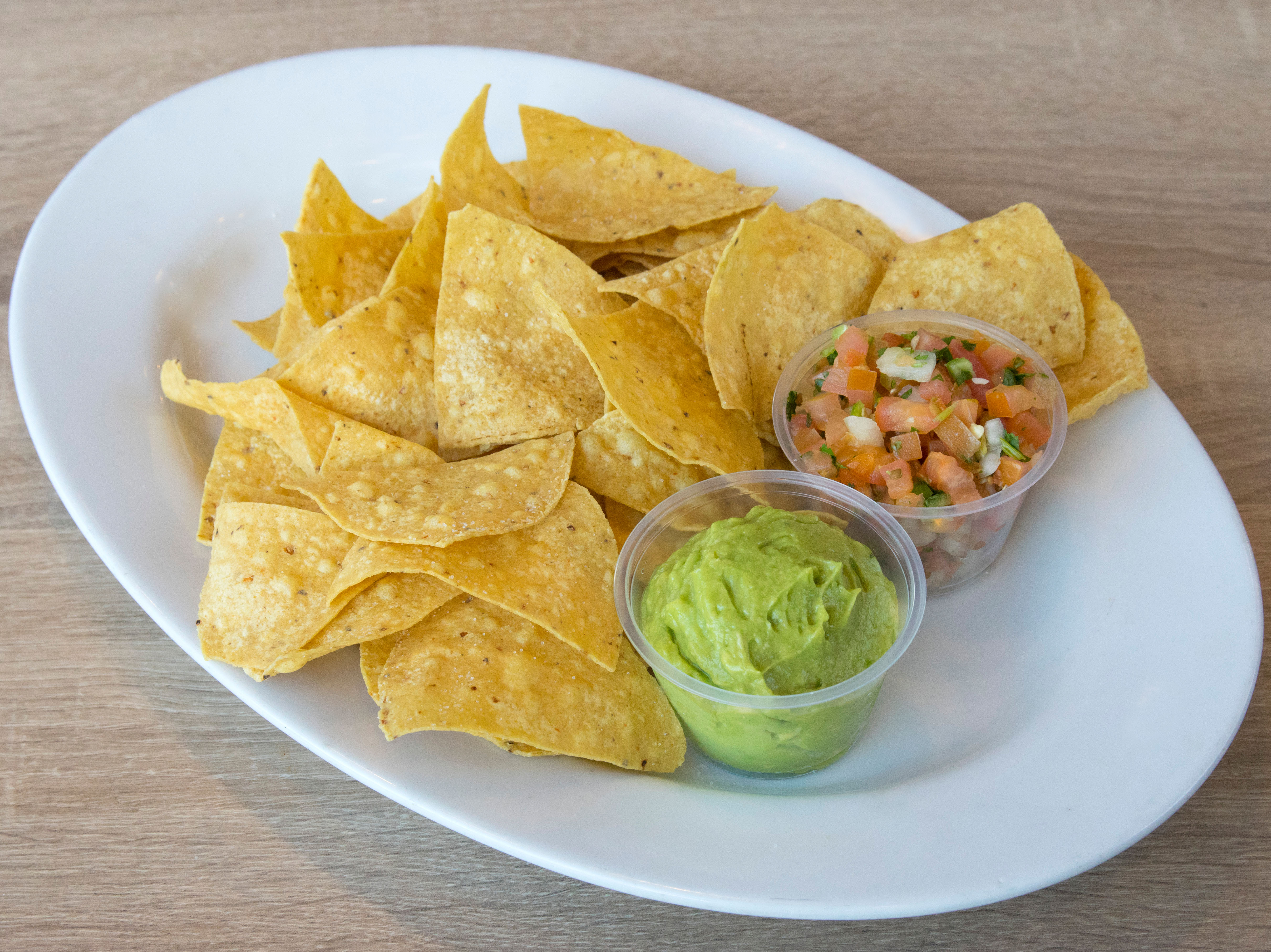 Order Chips and Salsa food online from Porkyland store, San Diego on bringmethat.com