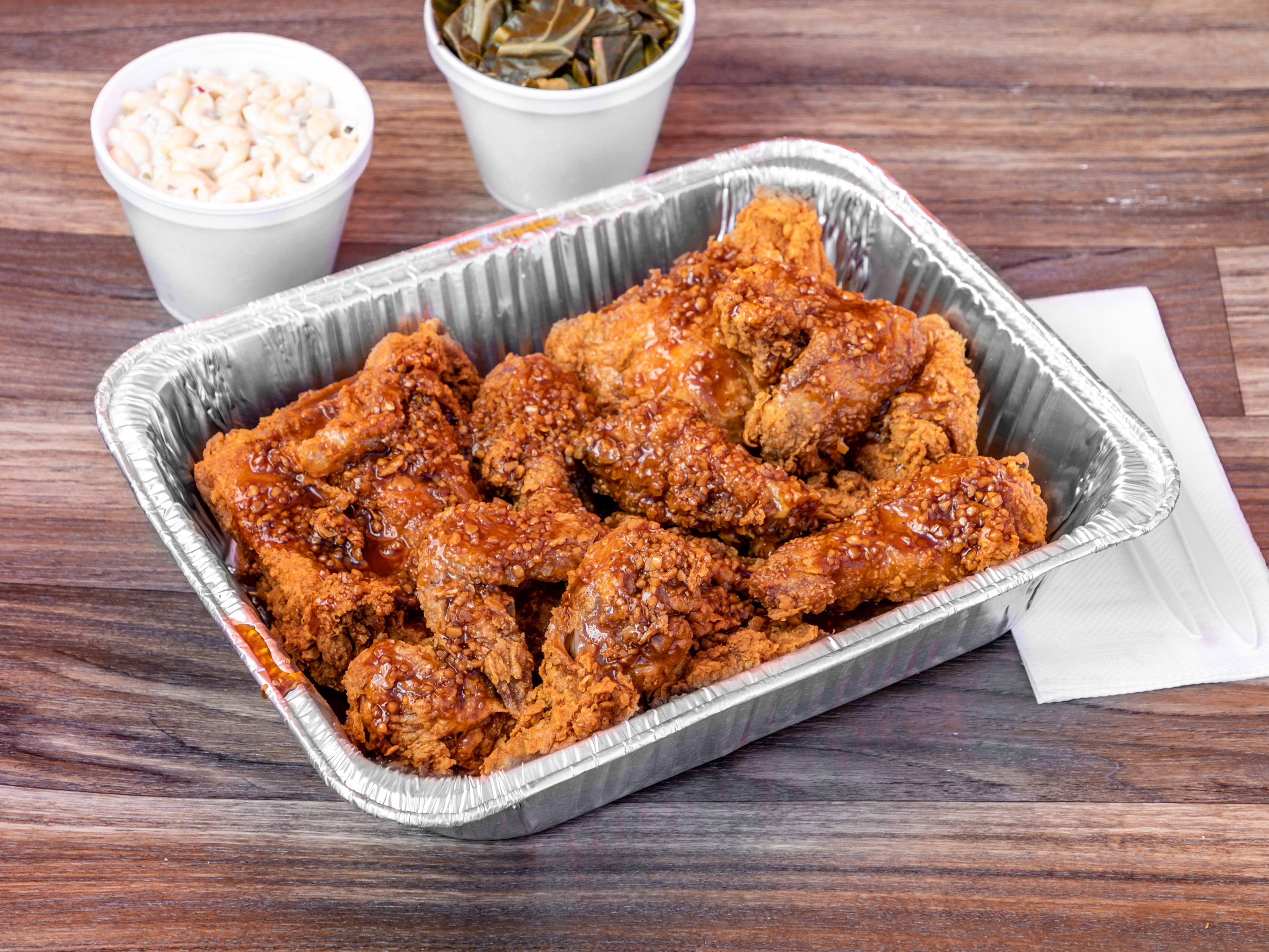 Order  15 Piece Soy Garlic Chicken and 2 Large Sides food online from Charlie Famous Fried Chicken store, Los Angeles on bringmethat.com