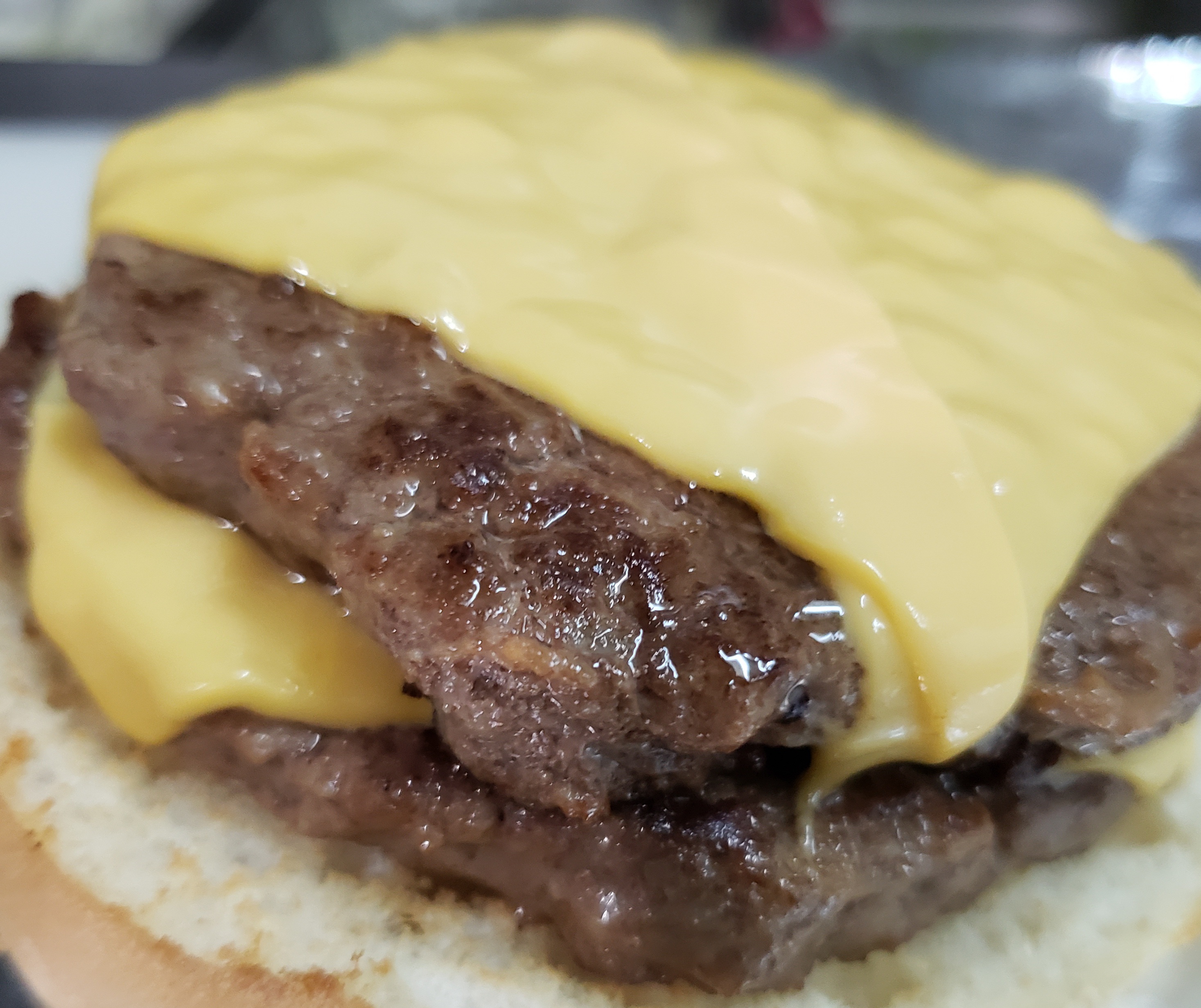 Order Double Cheeseburger food online from Pizza Mart store, Baltimore on bringmethat.com