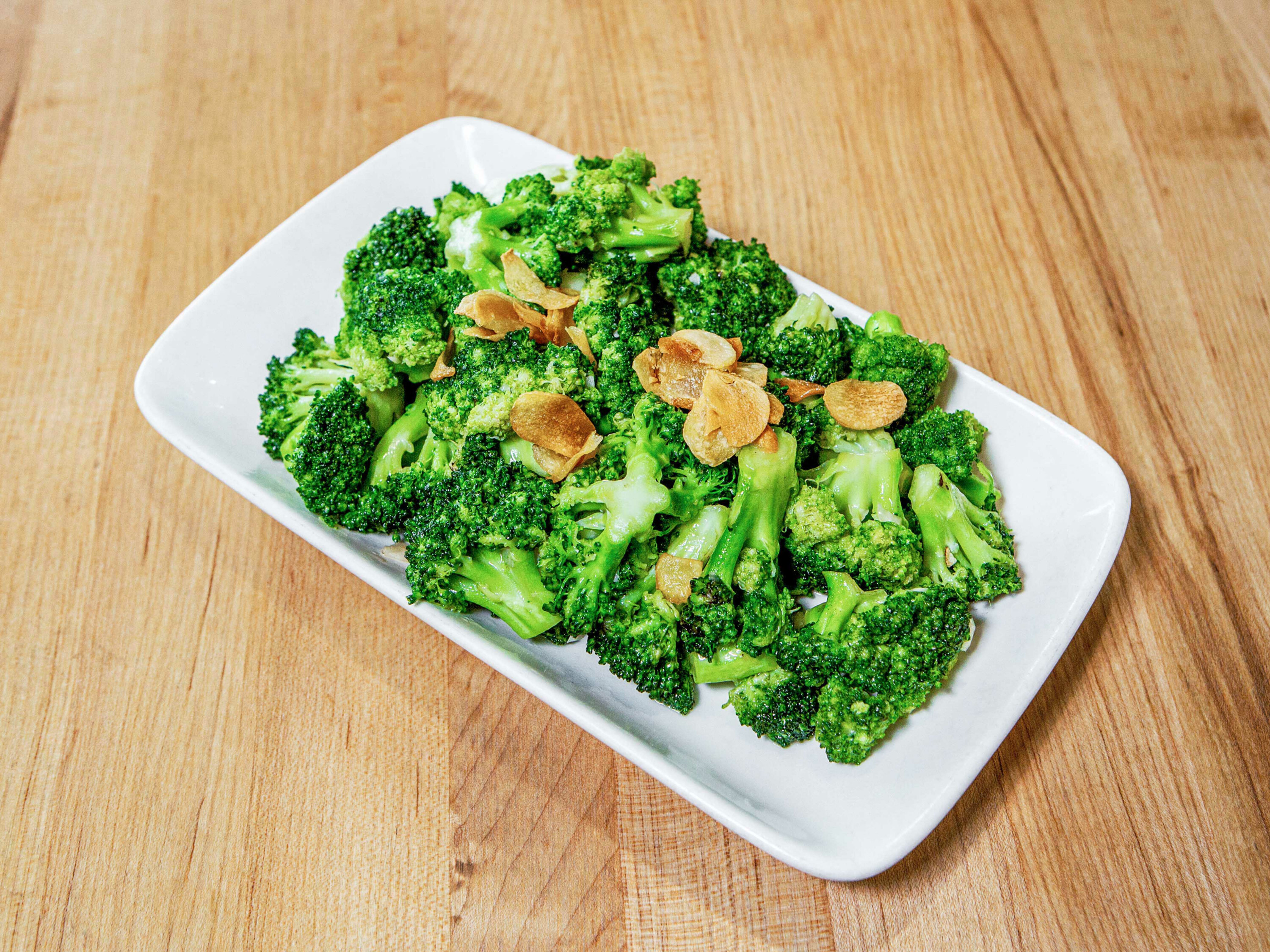 Order broccoli with garlic food online from Dan Modern Chinese store, Manhattan Beach on bringmethat.com