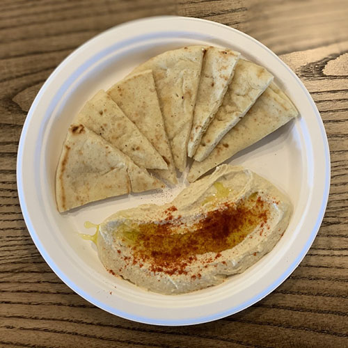 Order Hummus Single food online from Ghassan Restaurant store, Greensboro on bringmethat.com