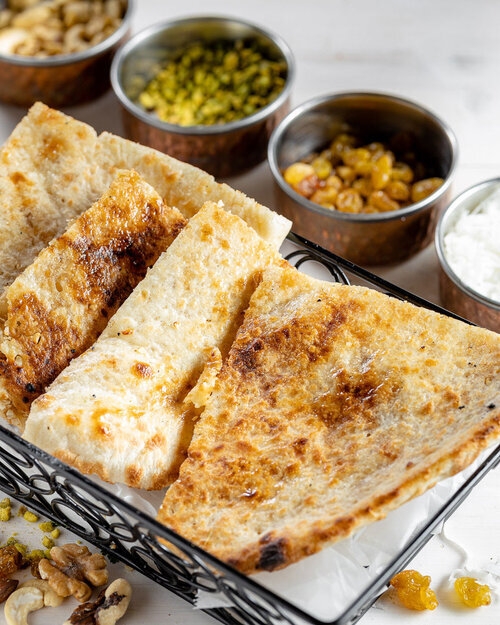 Order Sweet Nutty Naan food online from Saffron Valley Sugar House store, Salt Lake City on bringmethat.com