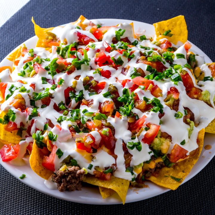 Order Loaded Nachos food online from First Down Sports Bar & Grill store, Arlington on bringmethat.com