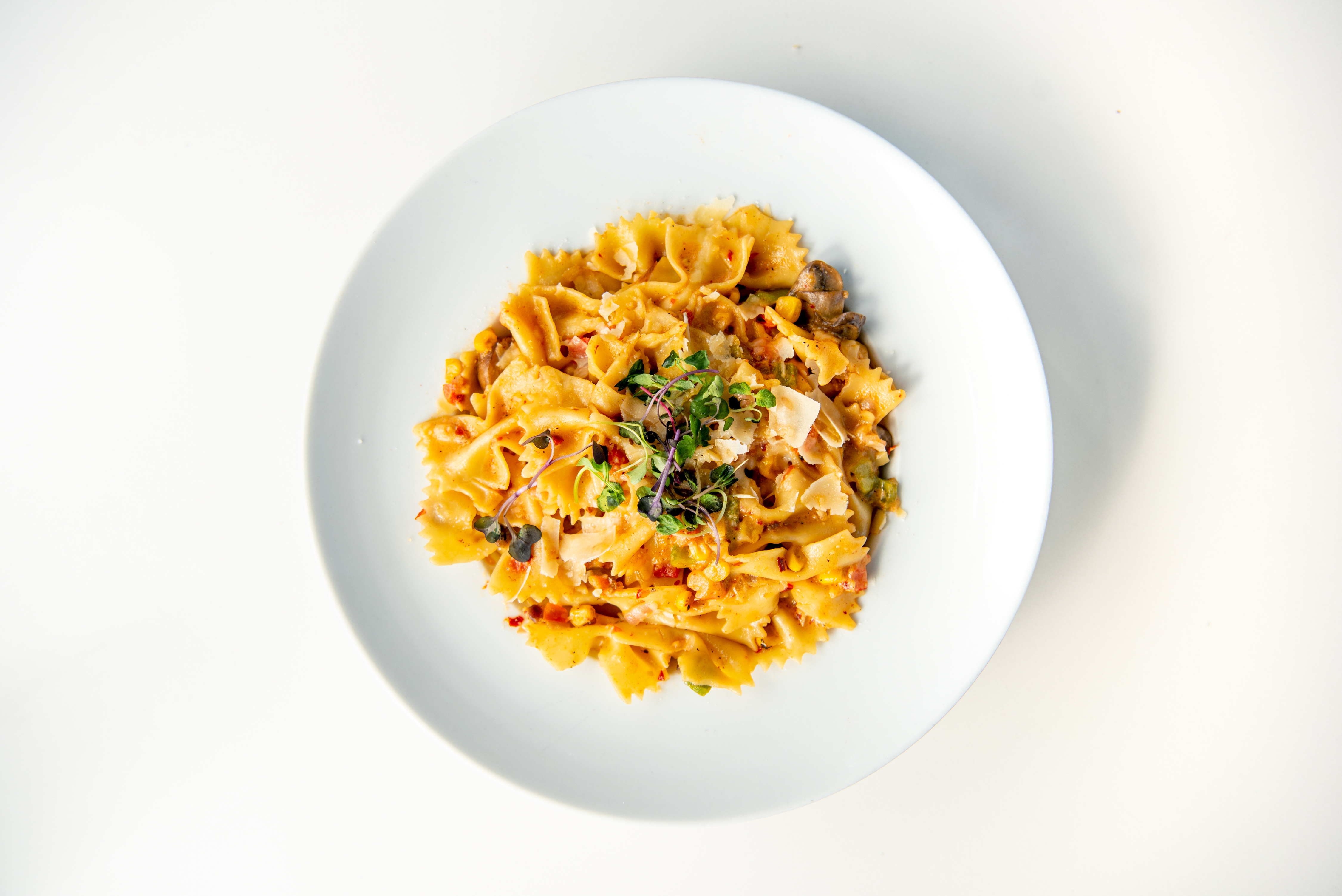 Order Spicy Farfalle Pasta food online from Society Kitchen store, Santa Monica on bringmethat.com