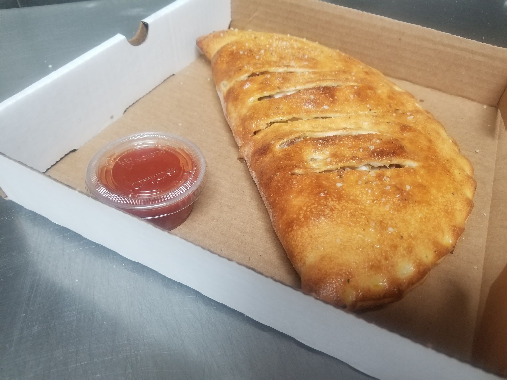 Order Chicken Philly Calzones food online from Castello Pizza store, Columbus on bringmethat.com