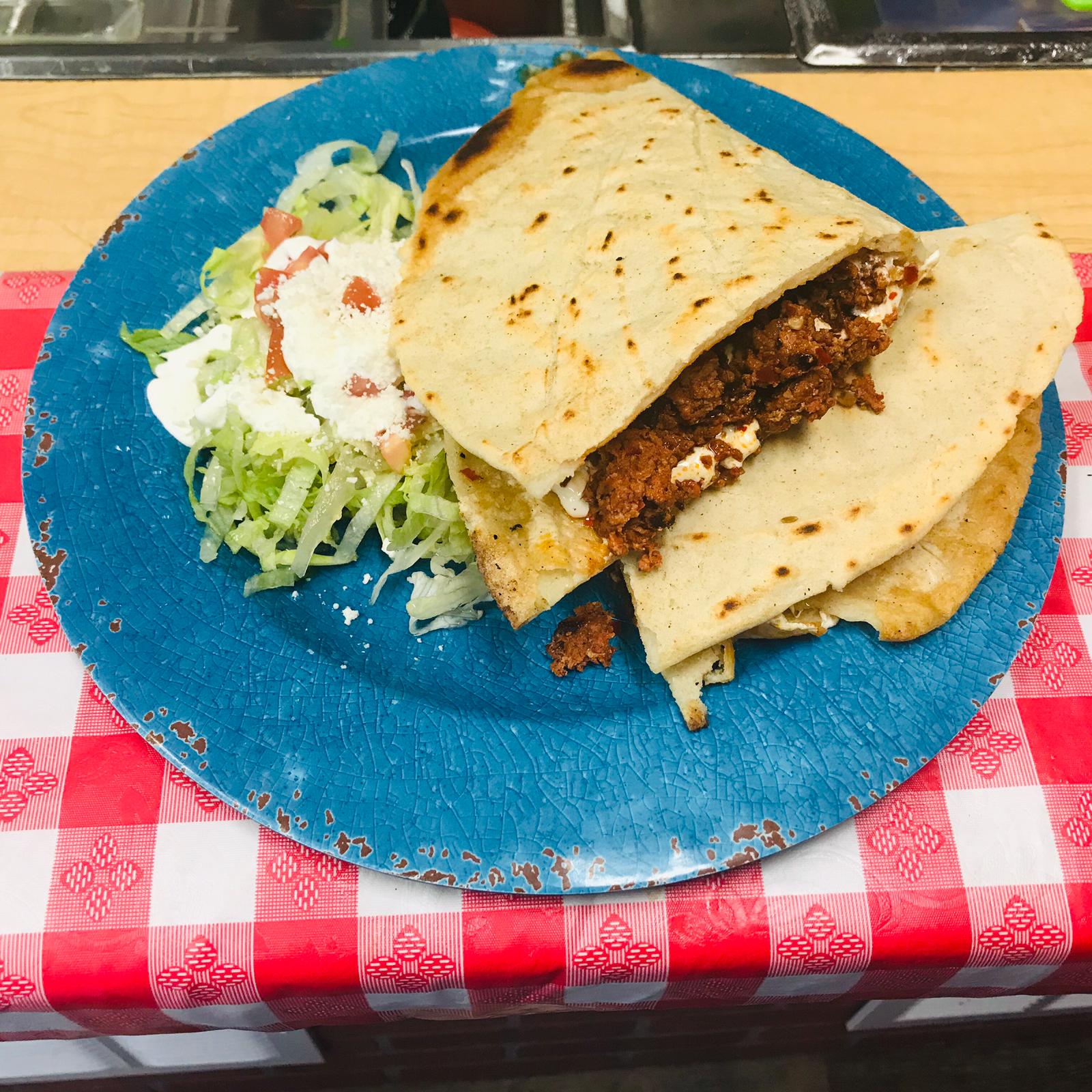 Order Spicy Pork Quesadilla food online from Taco House store, New Brunswick on bringmethat.com