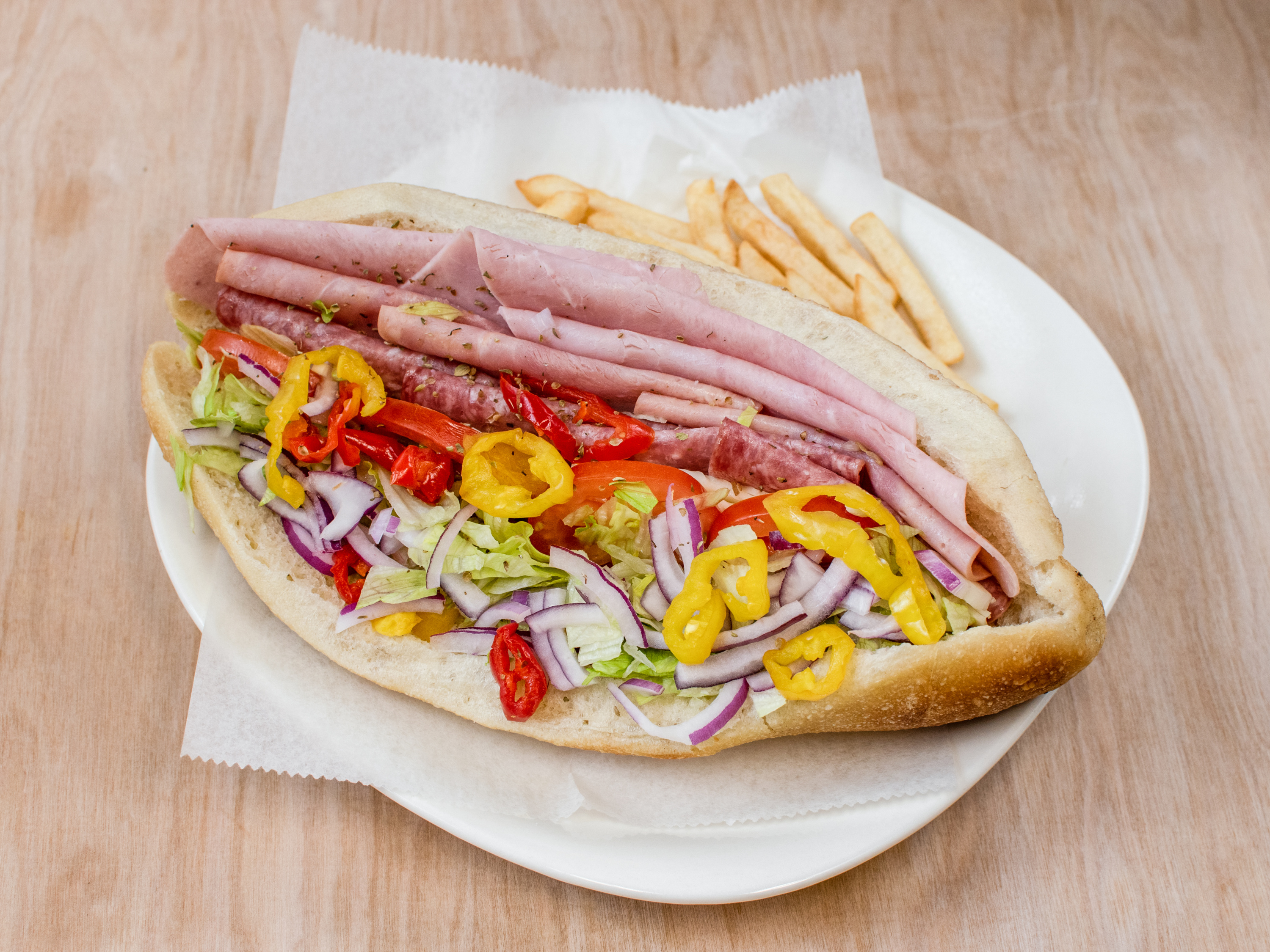Order Italian Sub food online from Brothers Pizza store, Harrisburg on bringmethat.com