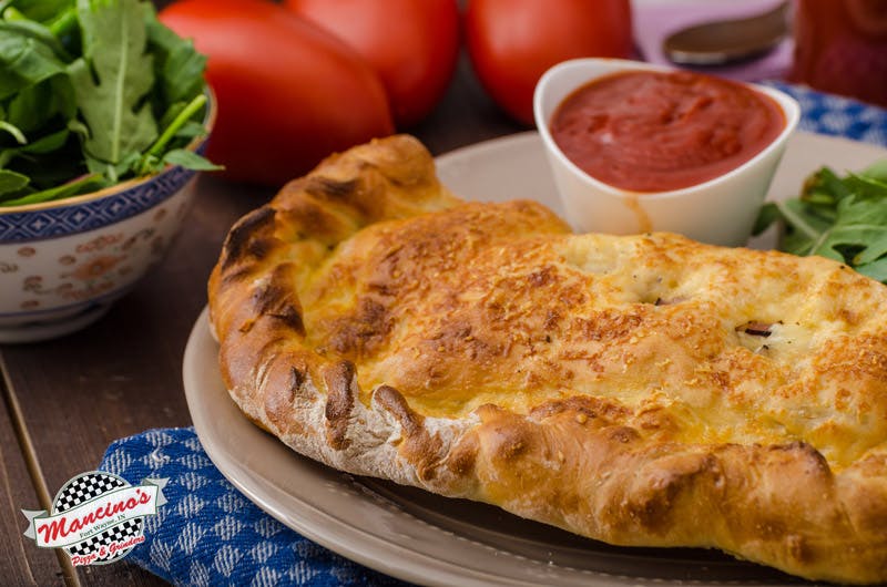 Order Calzone - Calzone food online from Mancino's store, Fort Wayne on bringmethat.com