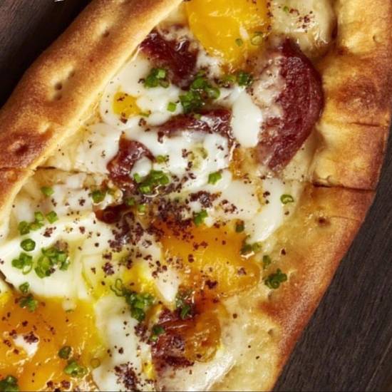 Order Sucuk, Egg, and Cheese Pide food online from Aya Sofia store, Saint Louis on bringmethat.com