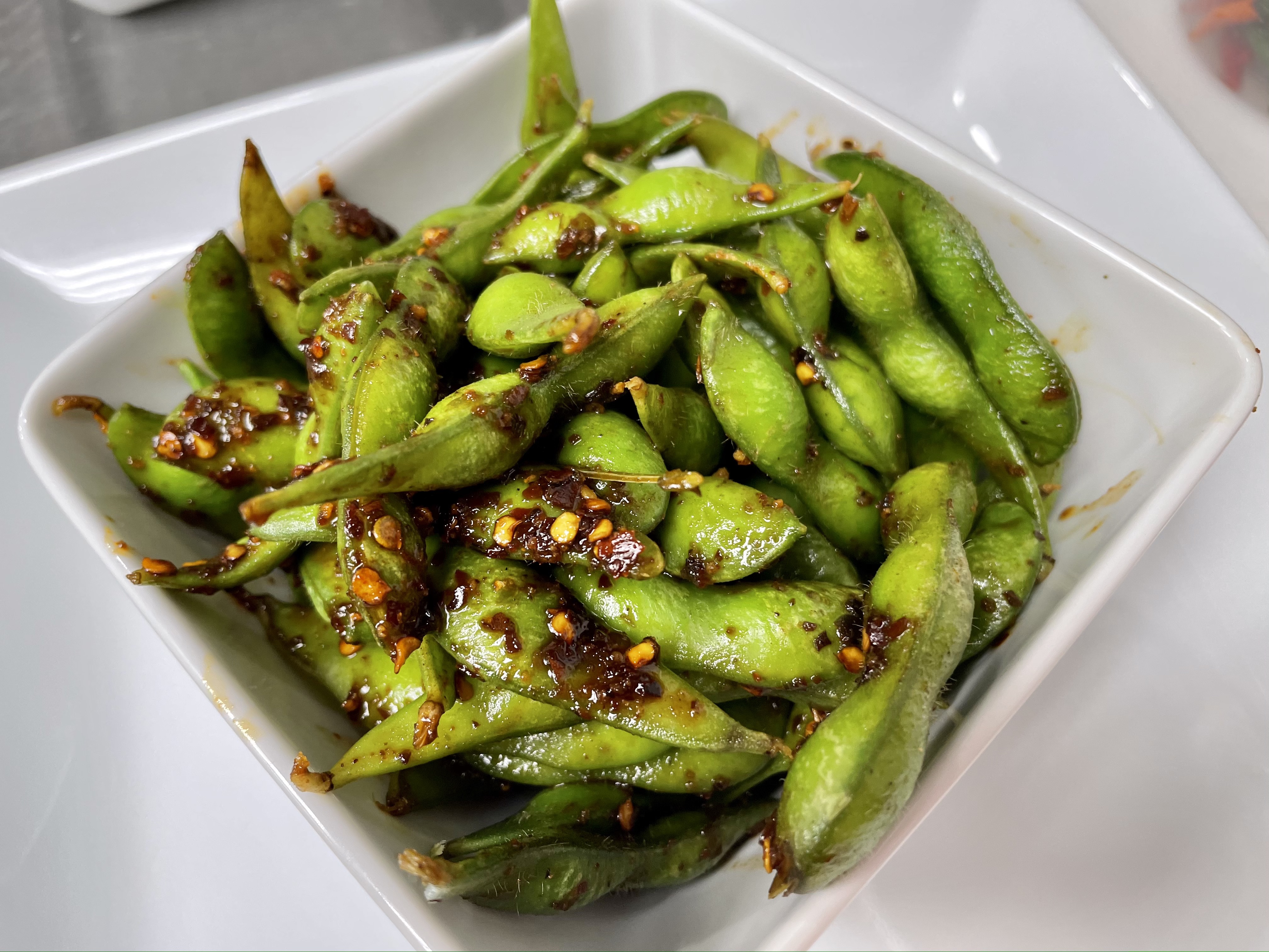 Order Edamame food online from Rice and Spice Thai Street Food store, Charlotte on bringmethat.com