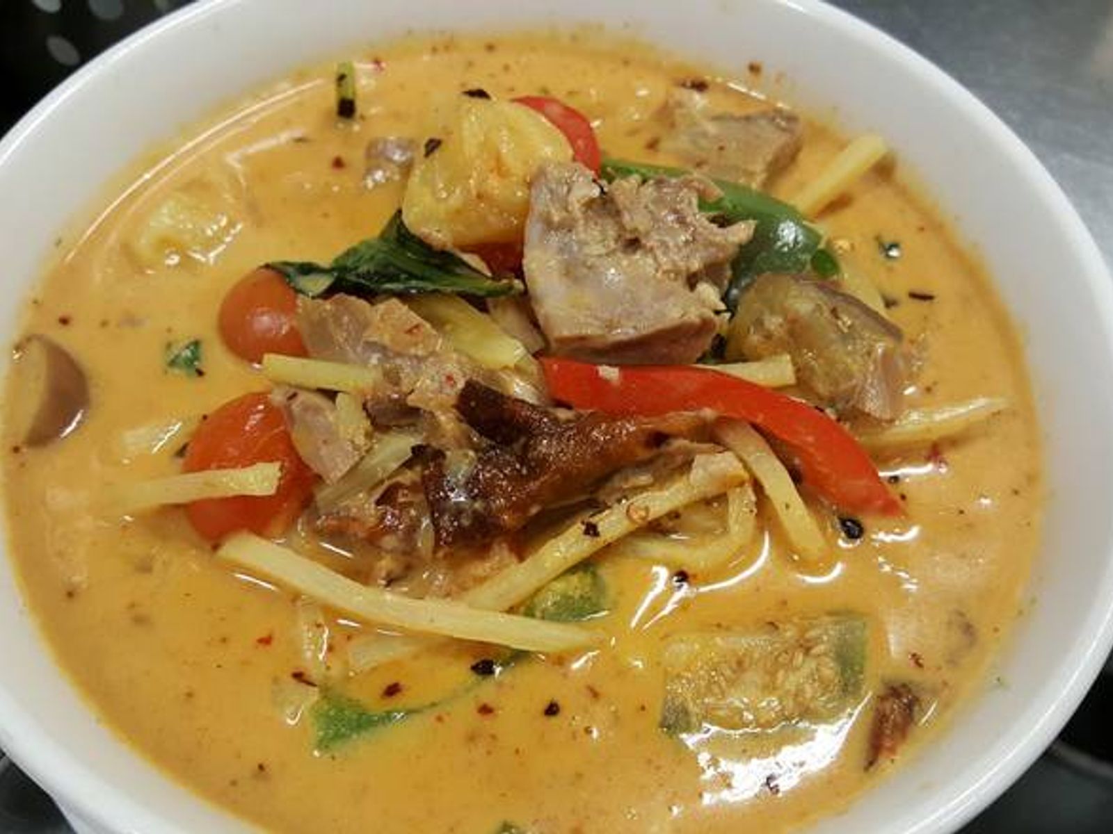 Order Gaeng Ped Phed Yang food online from Thai Orchid store, Vancouver on bringmethat.com