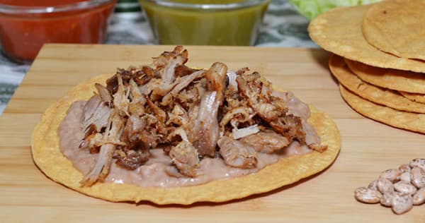 Order Carnitas Tostada food online from Federico's Mexican Food store, Phoenix on bringmethat.com