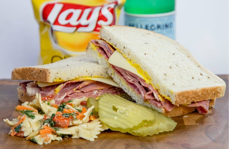 Order Corned Beef and Swiss On Rye with Salad food online from Butch store, Springfield on bringmethat.com