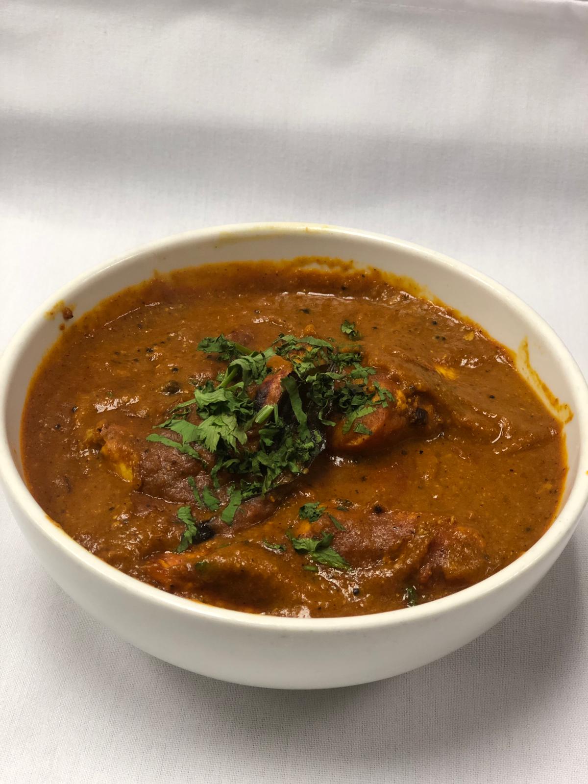 Order Chicken Xaccuti food online from Amiya Indian Cuisine store, Jersey City on bringmethat.com